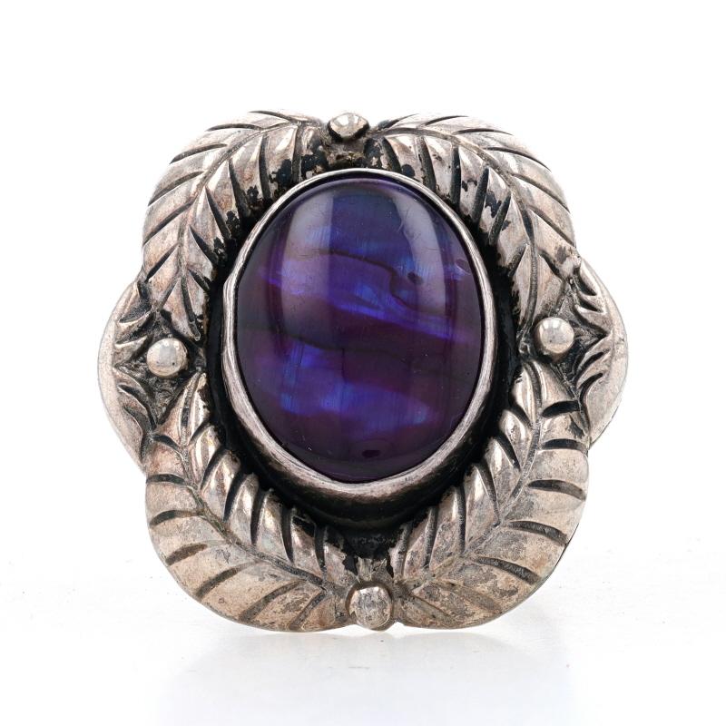 Size: 7
Sizing Fee: Down 2 sizes or up 2 sizes for $30

Design: Southwestern

Metal Content: 925 Sterling Silver

Stone Information
Abalone under Resin
Cut: Cabochon Oval 
Color: Purple

Style: Cocktail Solitaire 
Theme: Feathers 
Features: Split