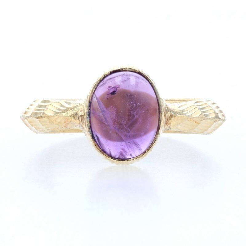 Size: 5

Metal Content: 925 Sterling Silver & Gold Plated

Stone Information

Natural Amethyst
Carat(s): 1.75ct
Cut: Oval Cabochon
Color: Purple

Total Carats: 1.75ct

Style: Solitaire 
Features:  Knife-edge band & etched