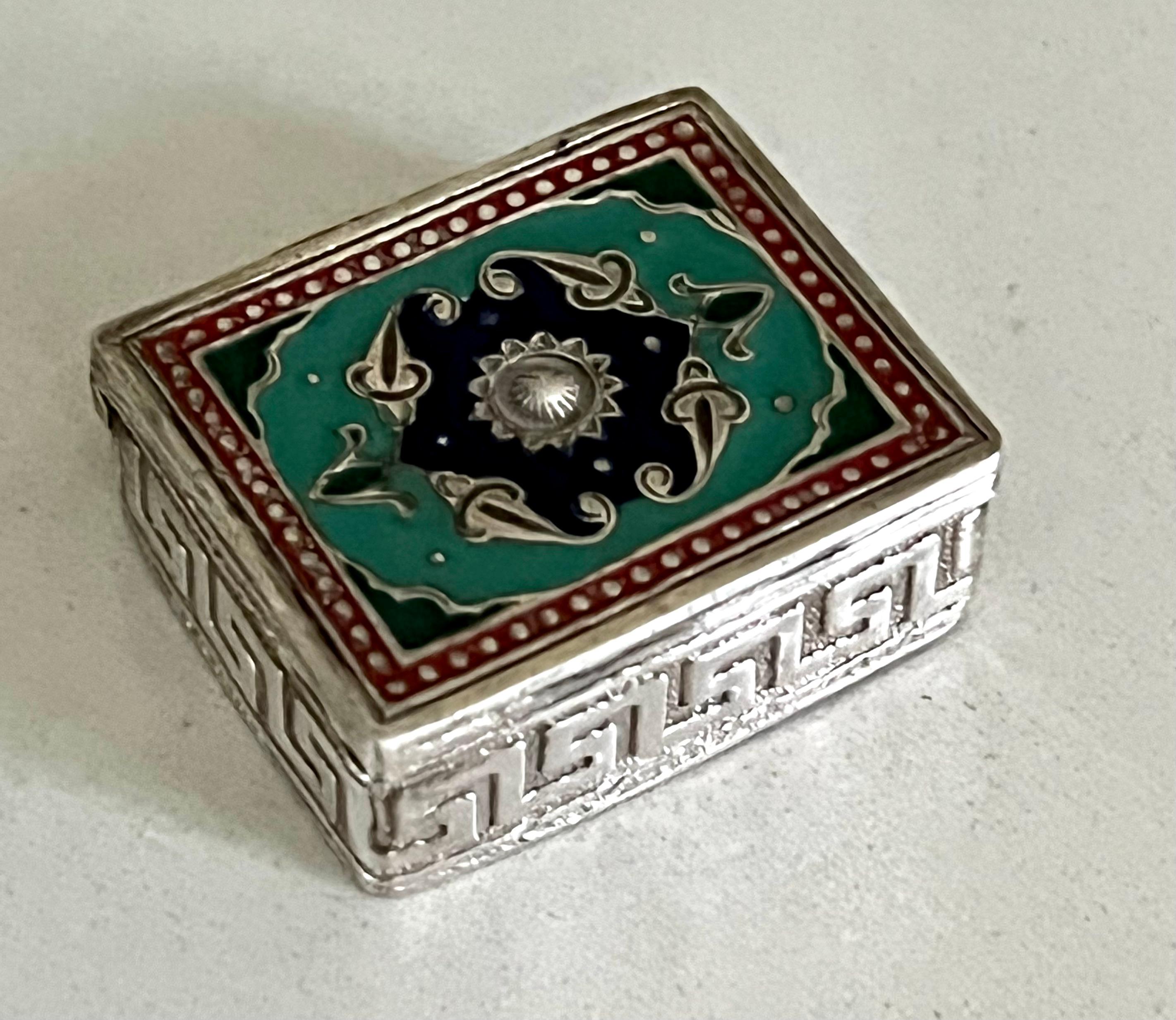 A silver snuff or pill box - all hand made and beautifully trimmed in enamel with a greek key detail around the edge of the box. great for pills, 420, or incense.