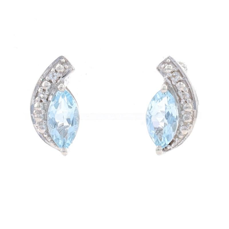 Metal Content: Sterling Silver

Stone Information

Natural Aquamarines
Treatment: Heating
Cut: Marquise
Color: Blue

Natural White Topaz
Cut: Round

Style: Short Drop
Fastening Type: Butterfly Closures

Measurements

Tall: 1/2
