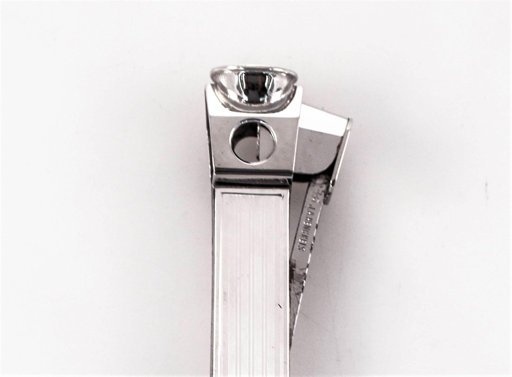 We are delighted to offer this rare sterling silver cigar cutter from the 1920s. Picture F.Scott Fitzgerald and those Long Island mansions, Duke Ellington and the Chrysler Building. This cigar cutter belonged to a generation gone but never