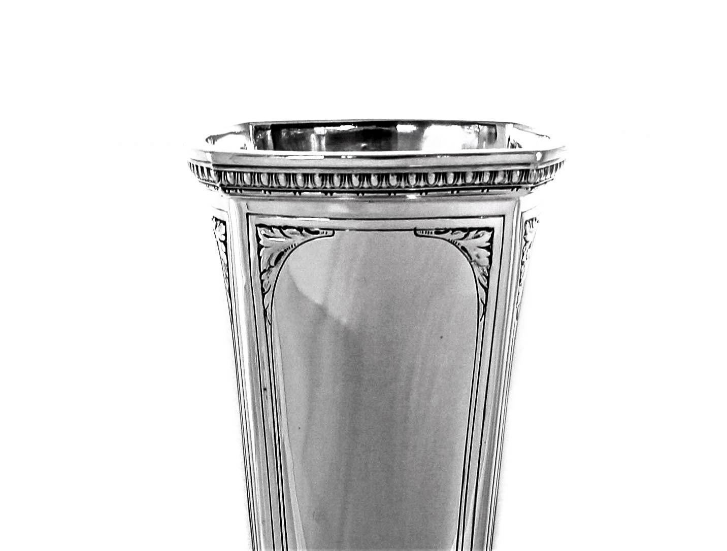 The Art Deco period was more than just style it was a way of life. Everything from Big Band to F. Scott Fitzgerald; it was the roaring twenties! The sterling vase from that period has that quintessential look. The straight lines and the four-sided