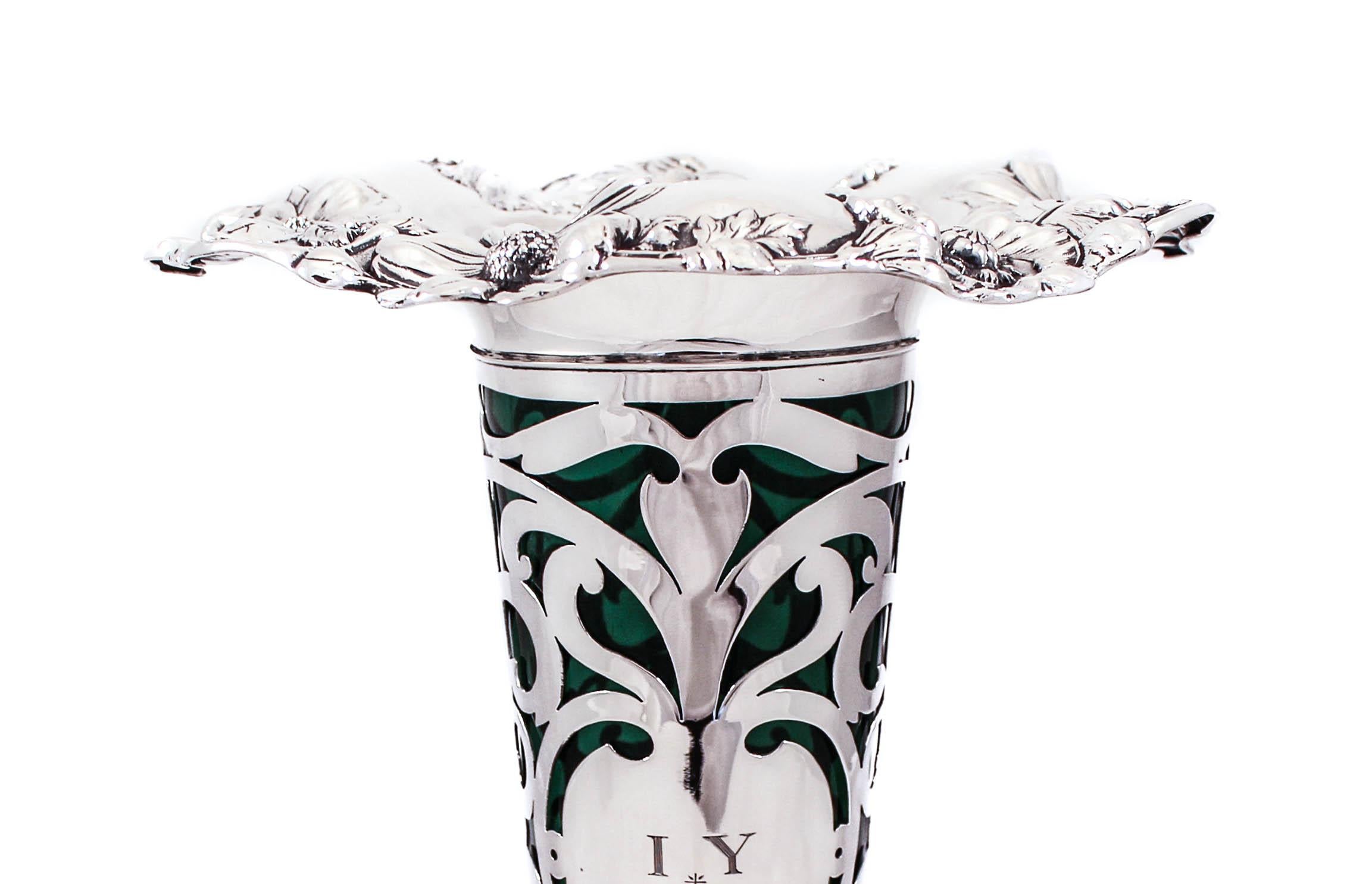 We are delighted to offer this rare sterling silver vase by Reed and Barton from the early 1900’s. Designed in the classic Art Nouveau style it has a flowers, leaves and vines decorating both top and bottom. Art Nouveau was inspired by natural forms