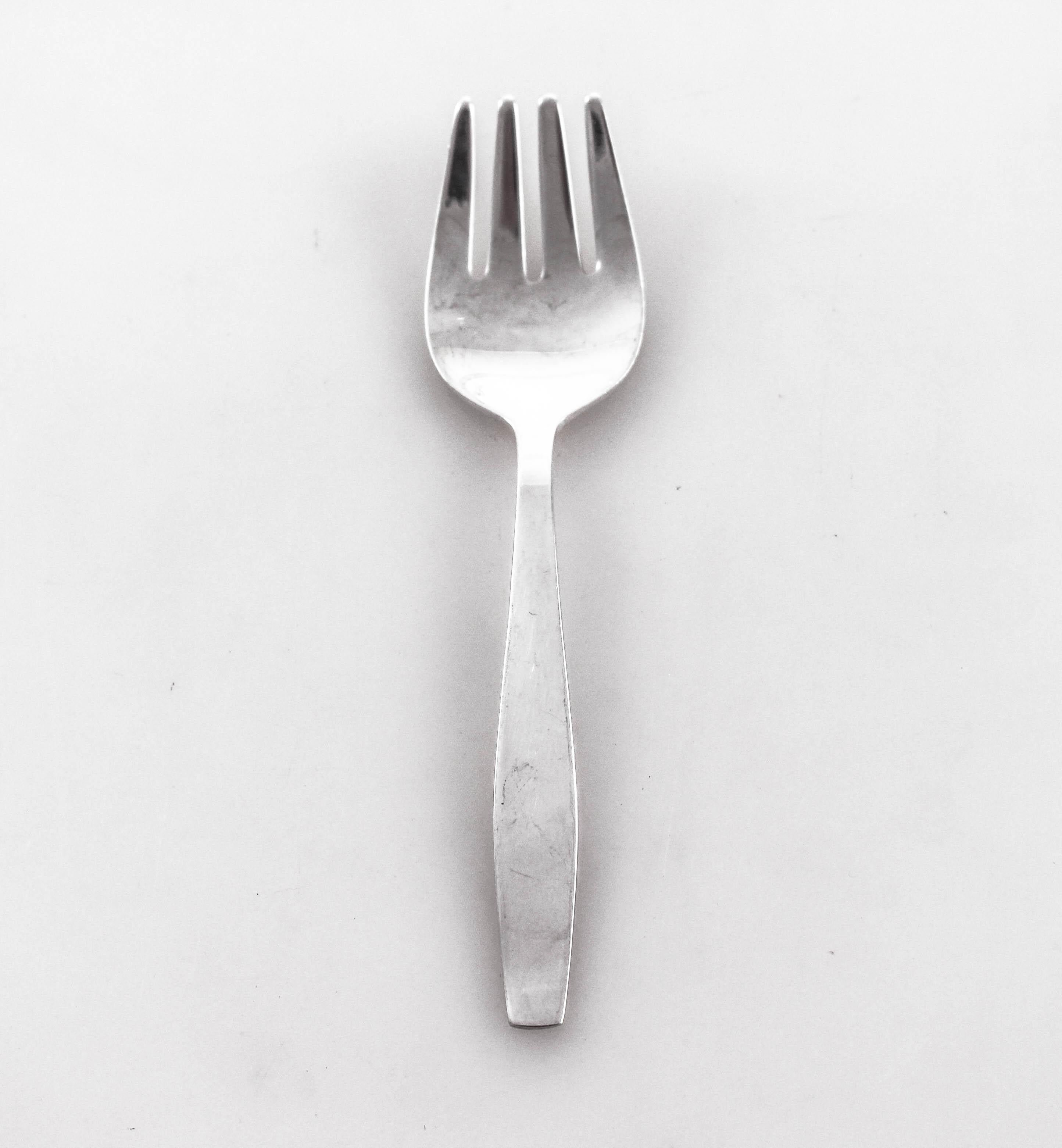 We are proud to offer this sterling silver baby fork and spoon set made by Towle Silversmiths. A very sleek modernist curved shape, the look was very ahead of its time. It's the perfect gift for either a boy or girl (unisex). The pattern is