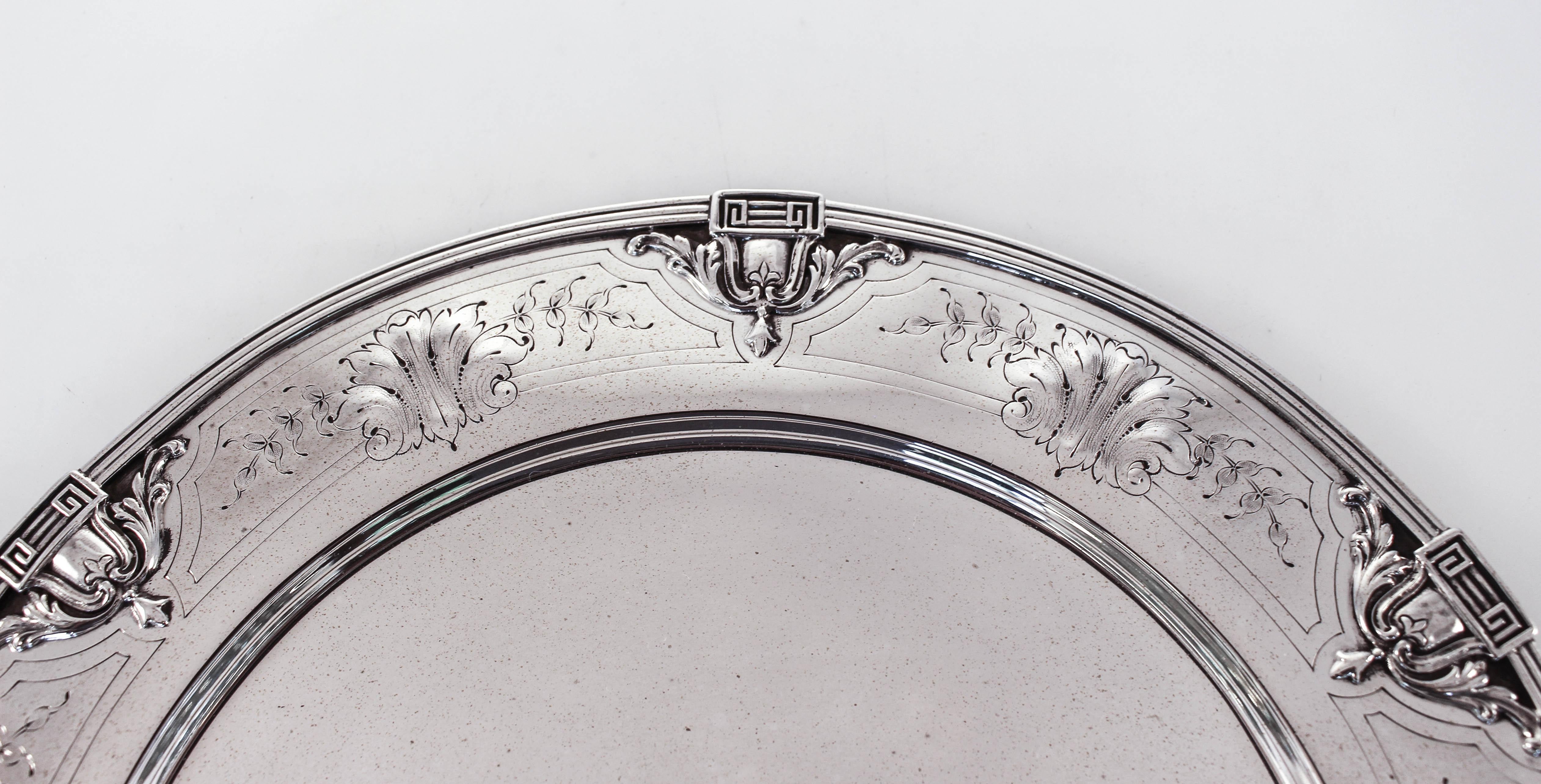We are delighted to offer this sterling silver basket by the Baltimore Silver Company. The border is decorated with six raised medallions and in-between each there are etched flowers and garlands. The rim and handle have the same design. In the