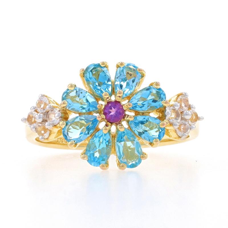 Size: 9

Metal Content: Sterling Silver (gold plated)

Stone Information

Natural Blue Topaz
Treatment: Routinely Enhanced
Carat(s): 2.00ctw
Cut: Pear

Natural Mystic Topaz
Treatment: Coating
Carat(s): .24ctw
Cut: Round

Natural Amethyst
Carat(s):