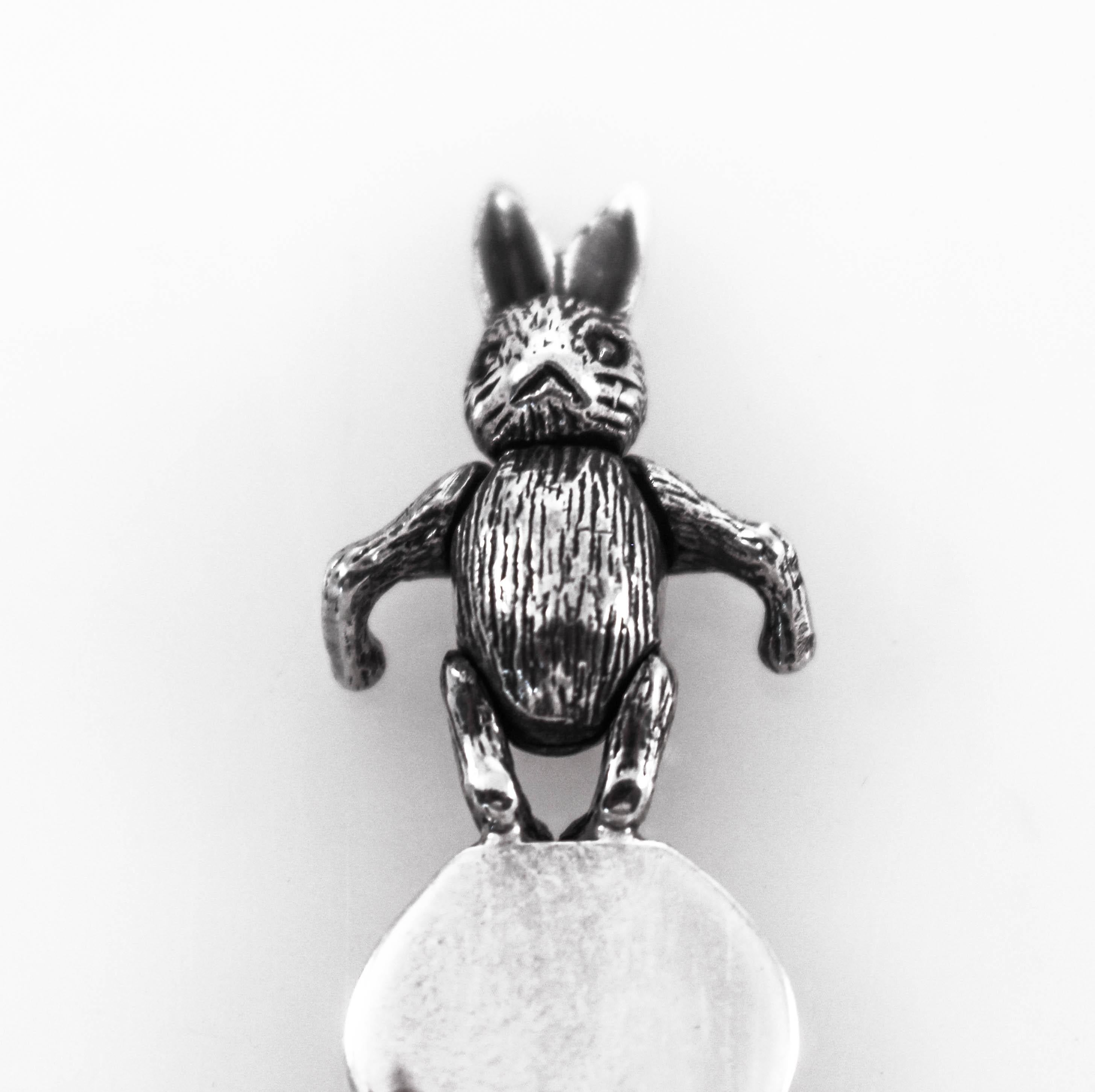 Offering this sterling silver rabbit bookmark. The rabbits head and hands move, so you can adjust them. The bunny is perched on top of the bookmark so even when the book is closed, you still see it. No more folding pages or losing your place, this