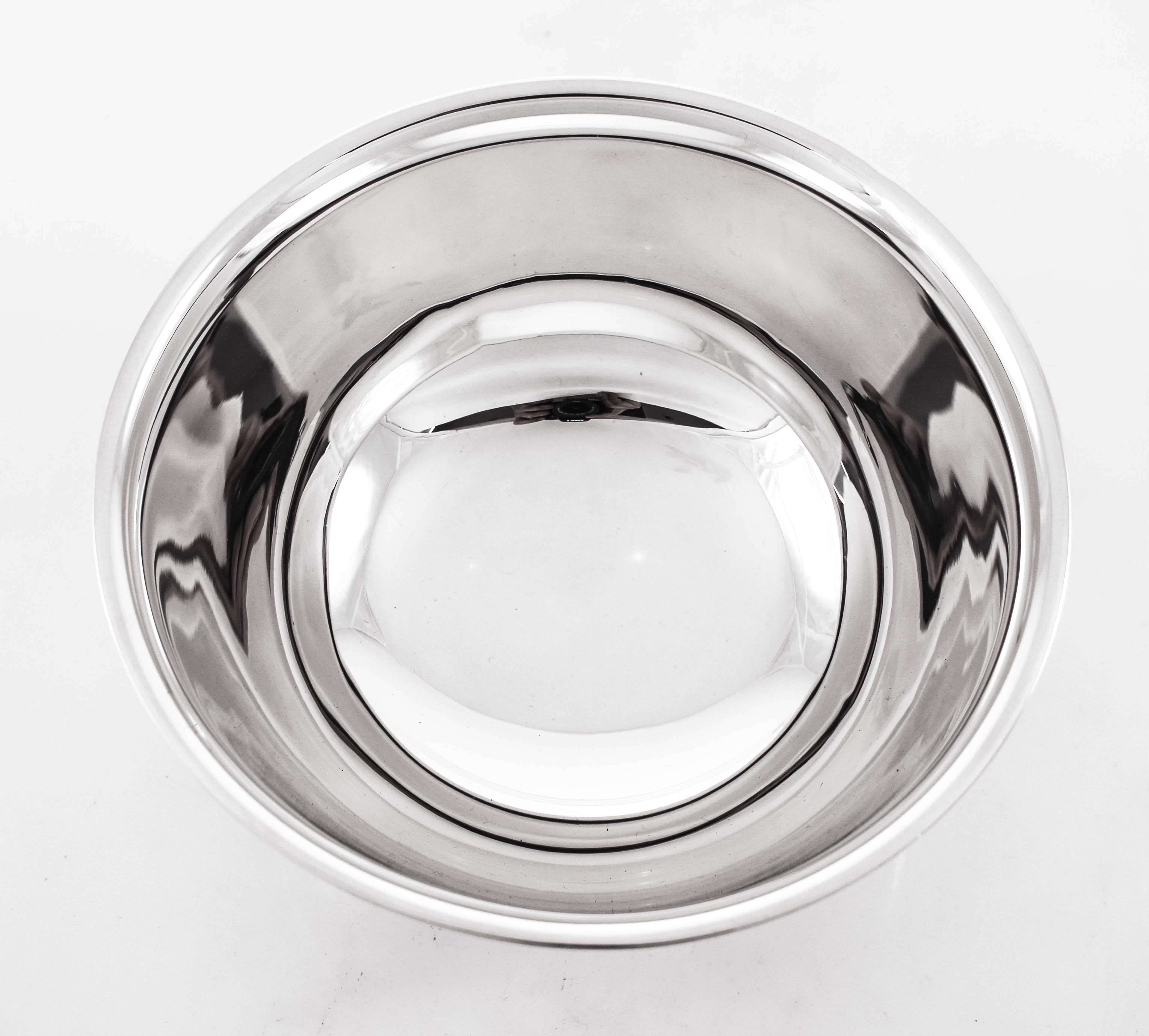 This sterling silver bowl was made during WWII by Lunt Silversmiths. It was a period of restraint in spending and in luxury items. “Less was more” and opulence was not in fashion. This is reflected in the architecture and styles of that period. This