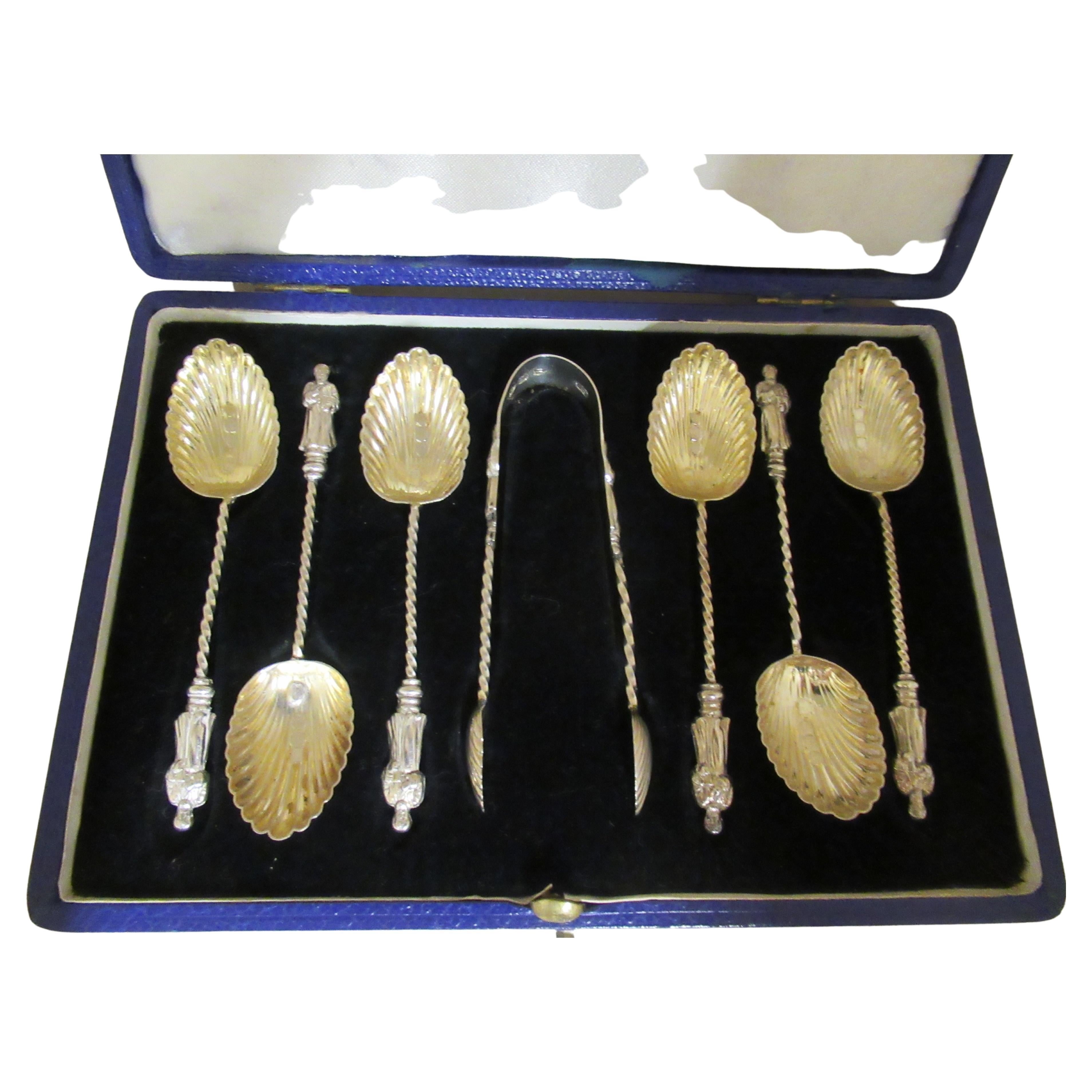 Sterling Box of 6 Apostle 
Shell Teaspoons + Tongs Hallmarked:- London 1895