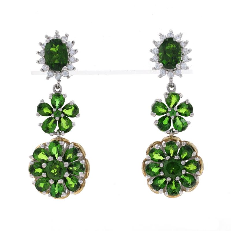 Metal Content: Sterling Silver (gold plated)

Stone Information
Natural Chrome Diopside
Color: Green

Natural White Topaz

Style: Halo Dangle
Fastening Type: Butterfly Closures
Theme: Flowers

Measurements
Tall: 1 15/32
