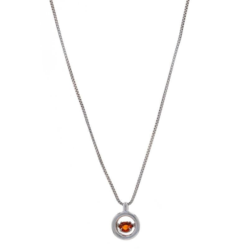 Metal Content: Sterling Silver

Stone Information
Natural Citrine
Treatment: Heating
Carat(s): .20ct
Cut: Round
Color: Orange

Total Carats: .20ct

Style: Dancing Solitaire
Chain Style: Box
Necklace Style: Chain
Fastening Type: Lobster Claw