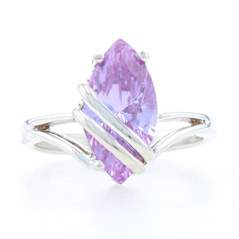 Size: 6
Sizing Fee: Down or up 2 for $30

Metal Content: 925 Sterling Silver

Stone Information
Pink Cubic Zirconia
Carat: 3.00ct dew
Cut: Marquise
Color: Purplish Pink

Style: Cocktail Solitaire 
Features: Split Shoulders

Measurements
Face Height
