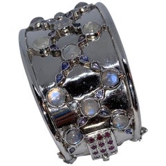 Cuff Bracelet in Sterling with Rainbow Moonstone, Tanzanite, and Ruby Clasp