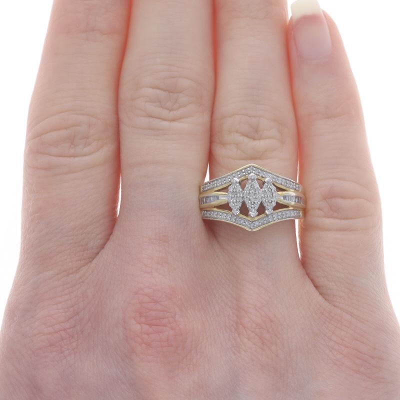Size: 7

Metal Content: Sterling Silver (gold plated)

Stone Information

Natural Diamonds
Carat(s): .25ctw
Cut: Single & Baguette
Color: H - I
Clarity: SI1 - I1

Total Carats: .25ctw

Style: Three-Stone Inspired Cluster with