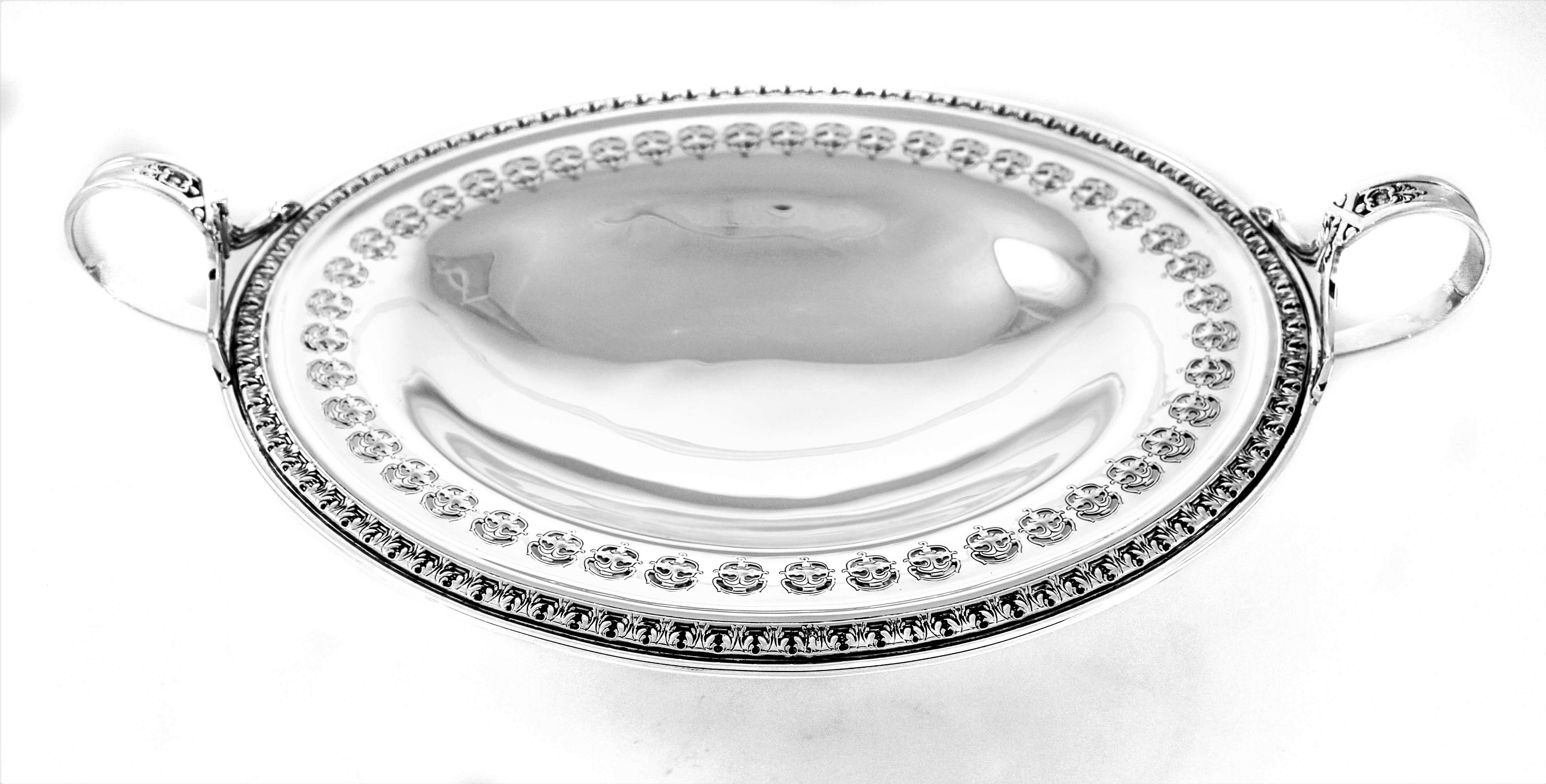 Proud to offer this sterling silver dish by the world renowned Bailey, Banks and Biddle of Philadelphia. Around the rim there is a decorative design that can also be found around the base. On the inside a cutout pattern goes around the inner edge.