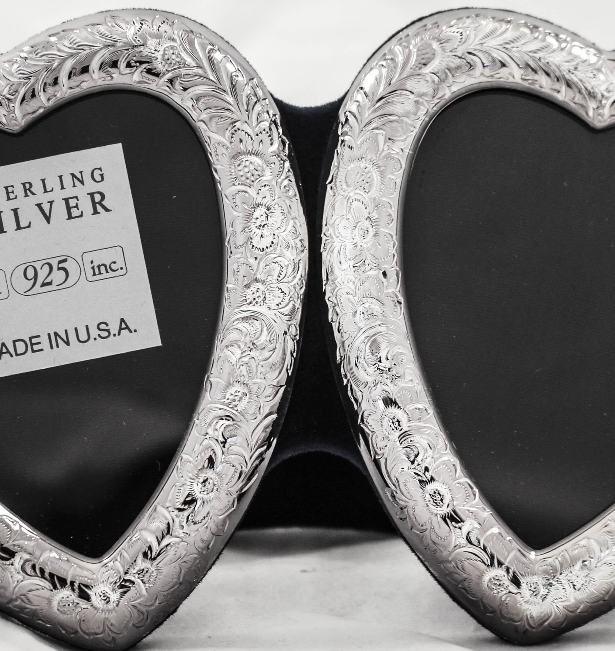 We are offering a new sterling silver double-heart frame. Each heart has an etched flowers and leaves motif. The back is lined in a rich blue velvet. Valentine’s day or any day to look at the ones you love. (A great gift for twins).