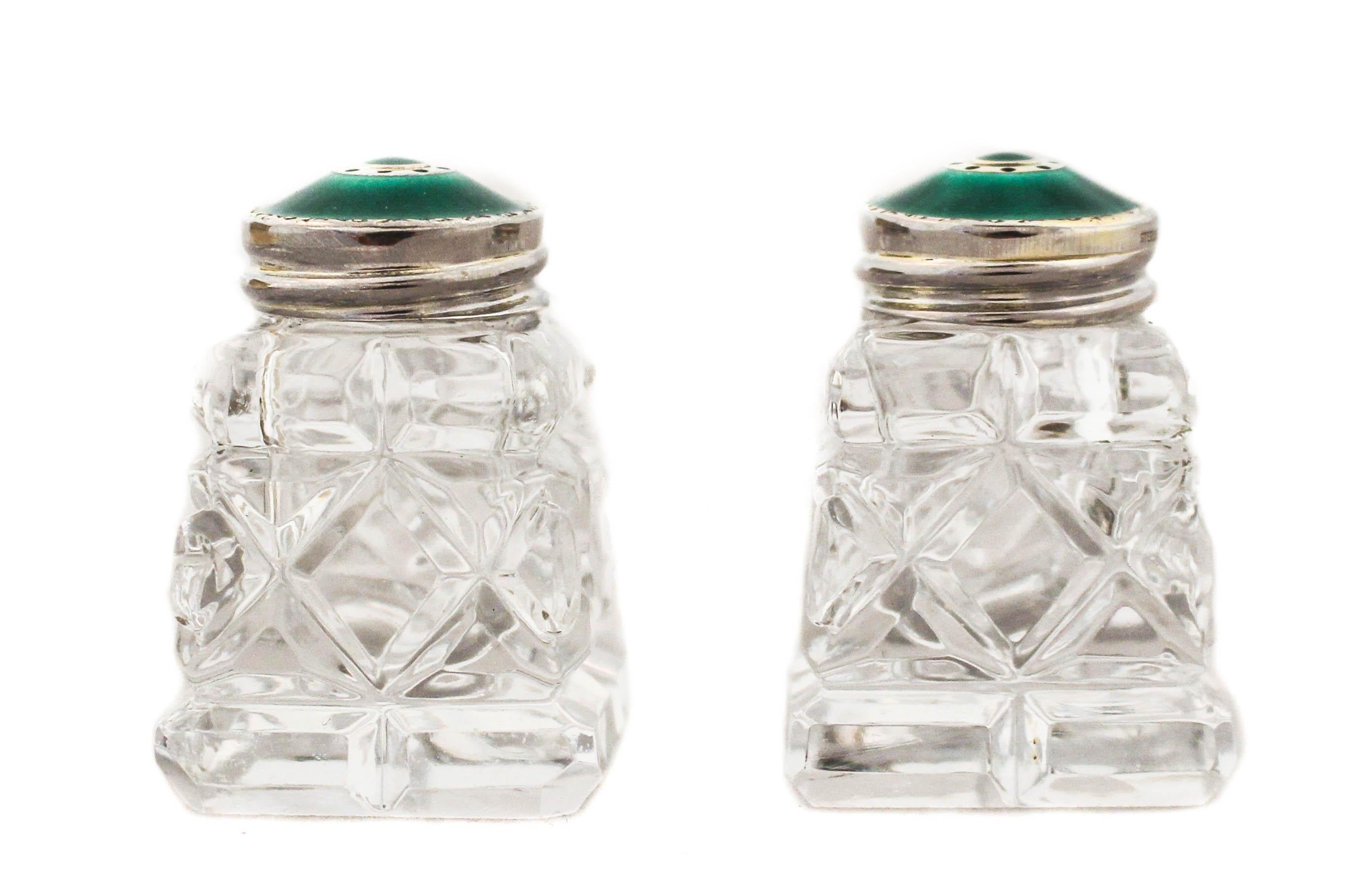 These beautiful sterling silver and avocado green enamel salt shakers come in their original box.  Made in Norway in the post war 1940’s, they are in mint.  The rich green covers really pop out and give color to your table.  The salt never needs to