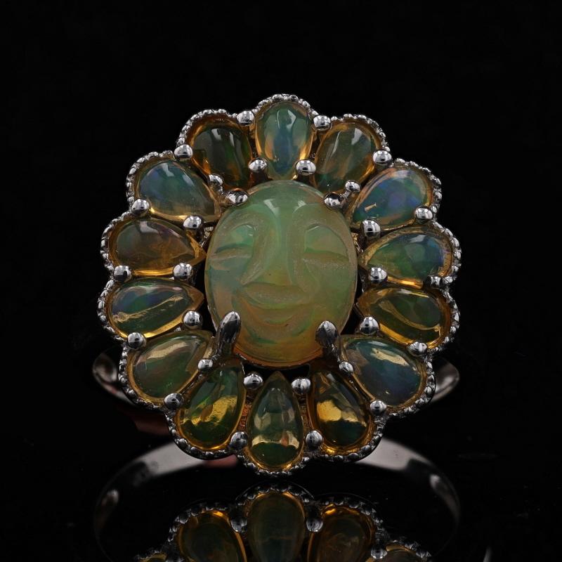 Sterling Ethiopian Opal Celestial Face Halo Ring 925 Sun/Moon Milgrain Sz 10 1/4

Stone Information
Natural Ethiopian Opals
Cuts: Carved Oval Cabochon & Pear Cabochon

Additional information:
Material: Metal Sterling Silver
Style: Solitaire with