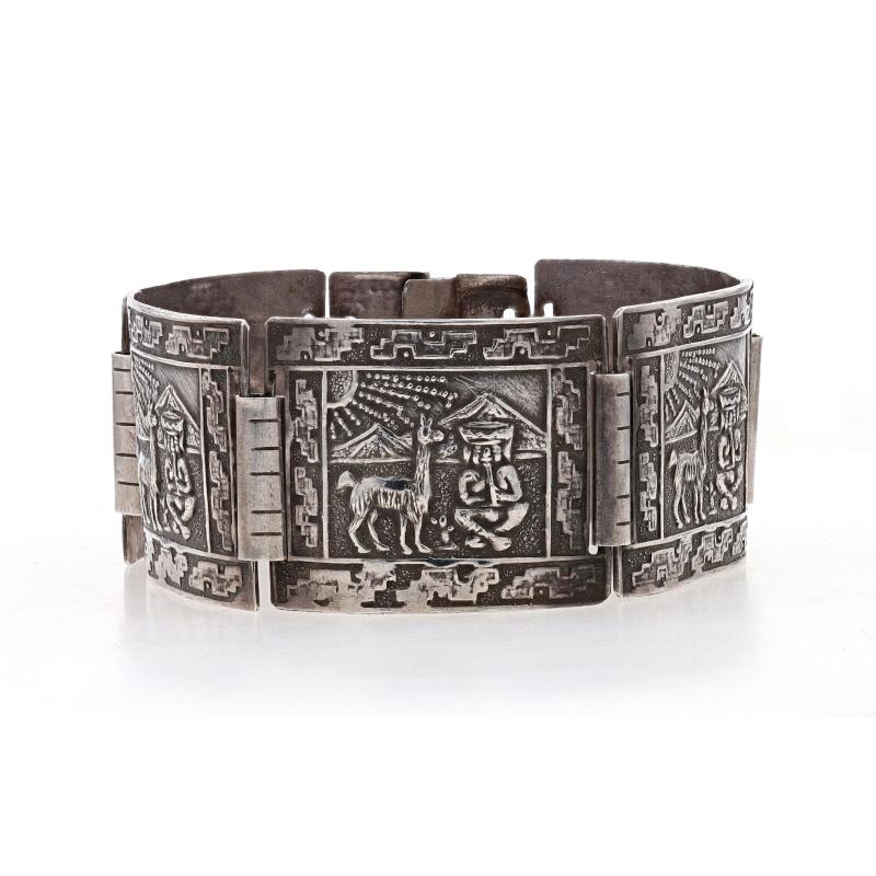 Metal Content: Sterling Silver

Style: Curved Panel
Fastening Type: Slide Bar Clasp
Theme: Figural, Llama

Measurements
Length: 6 3/4