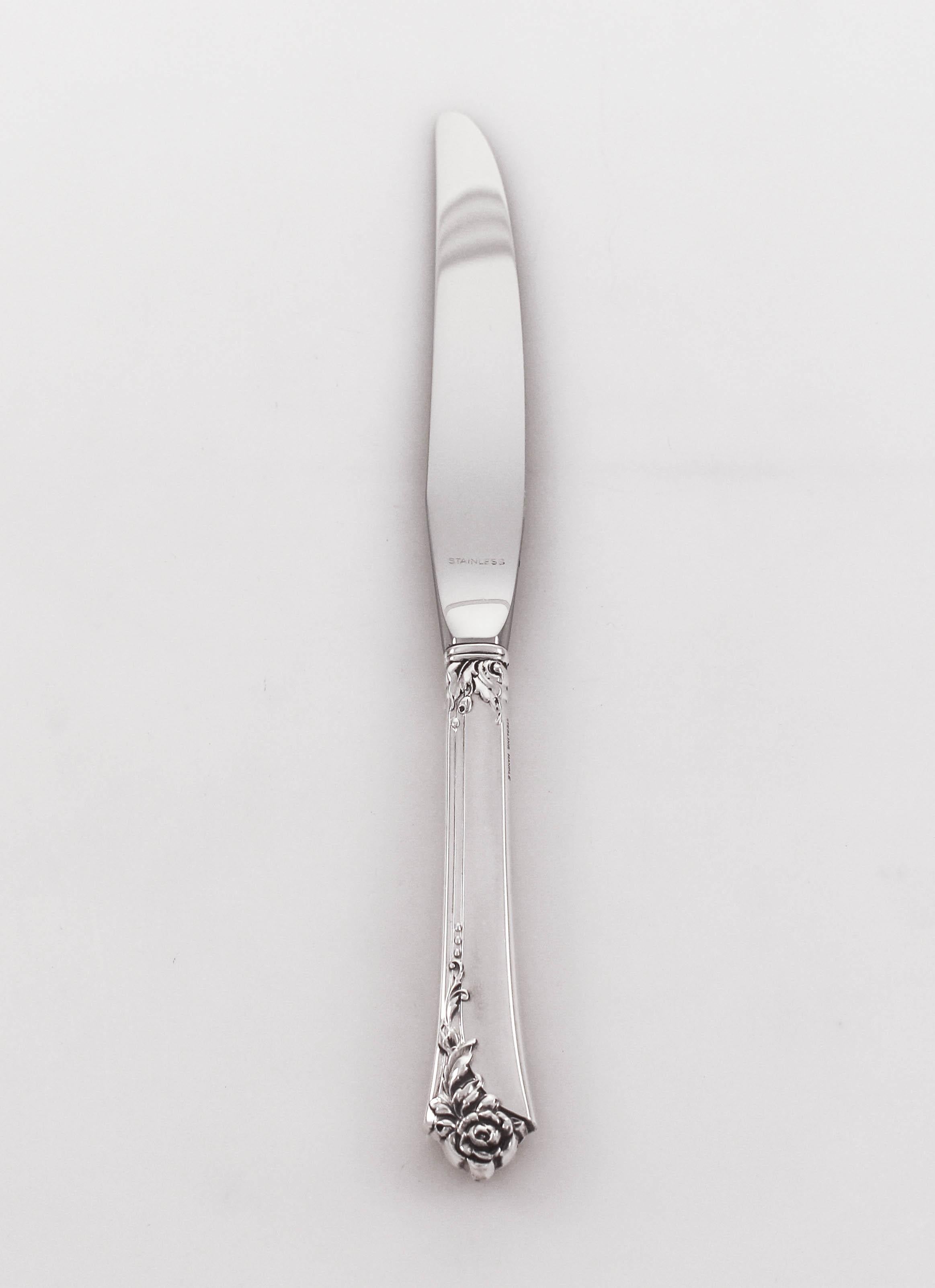 We are thrilled to offer this set of sterling silver flatware from 1946. A complete set of 16 settings with double dessert spoons (i.e., ice cream and tea). It has a modern look with just a hint of decoration on the bottom edge. A complete set is