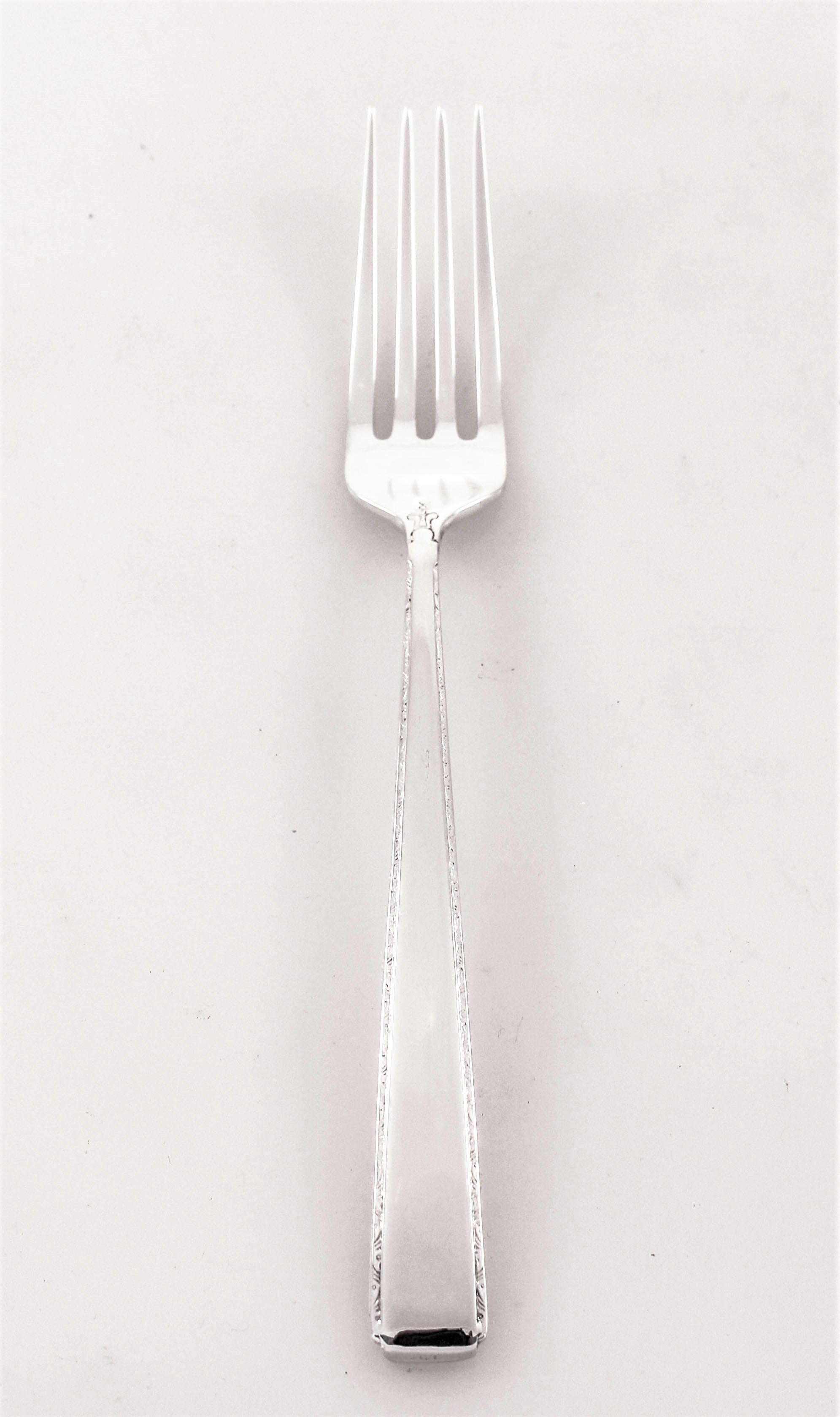 We have this gorgeous sterling silver flatware set priced to sell. Identical to Towle’s 1939 “Old Lace” pattern, this set is from the same period. A thin decorative motif runs down each side of the handle. At the very bottom a slight indentation on