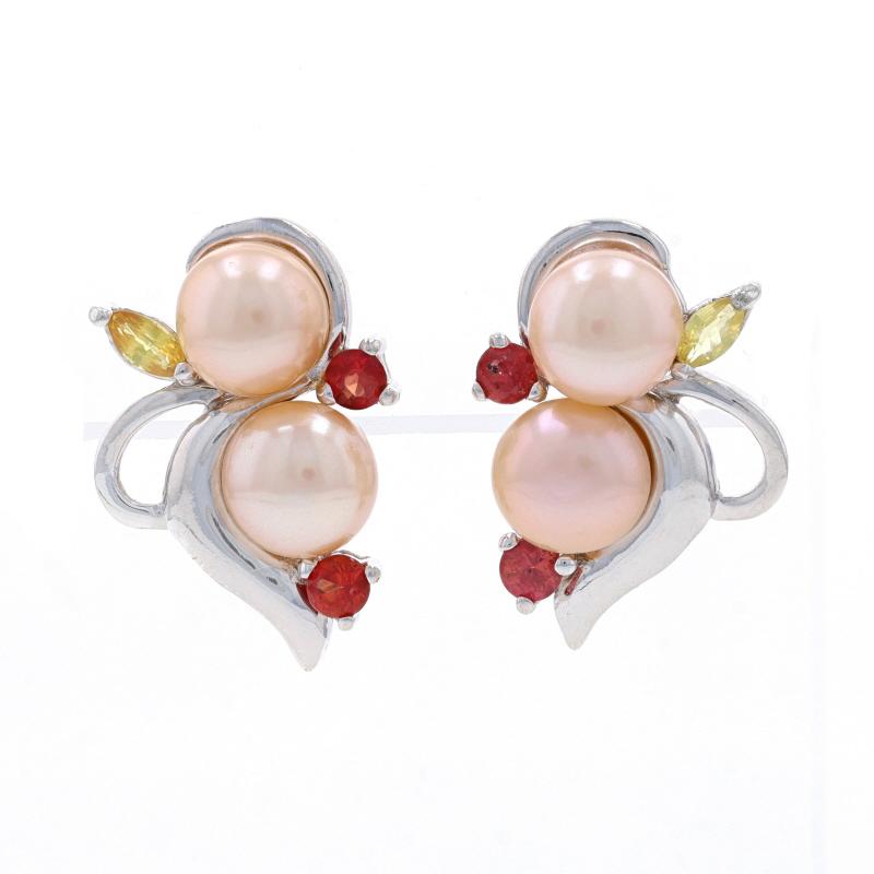 Metal Content: Sterling Silver

Stone Information
Freshwater Pearls
Color: Peach
Diameters: 6.5mm - 6.6mm

Natural Sapphires
Treatment: Beryllium Treated
Carat(s): .40ctw
Cut: Round & Marquise
Color: Orange & Yellow

Total Carats: .40ctw

Style: