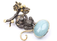 Sterling Gold plate 22.82 ct. Aquamarine, Sapphire, Garnet Monkey Brooch