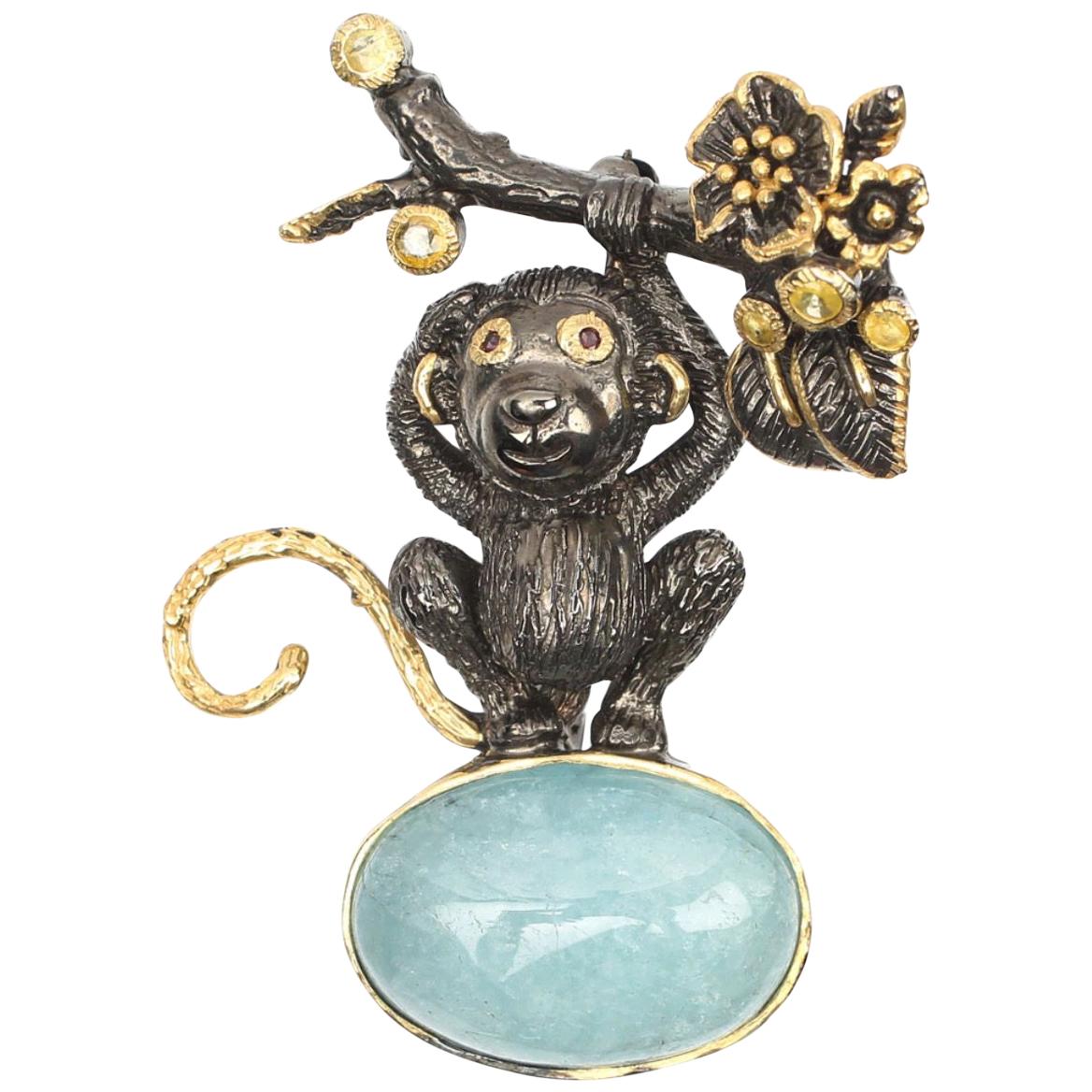 Sterling Gold plate 22.82 ct. Aquamarine, Sapphire, Garnet Monkey Brooch For Sale