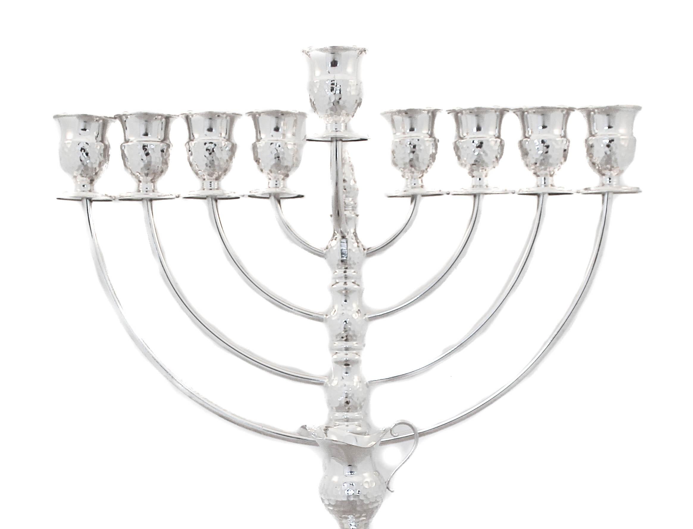 We are happy to offer you this sterling silver hammered menorah. With Hanukkah just a few weeks away, now is the time to treat yourself to a gorgeous new silver menorah. It has a hammered finish that is contemporary and yet classic. The top portion