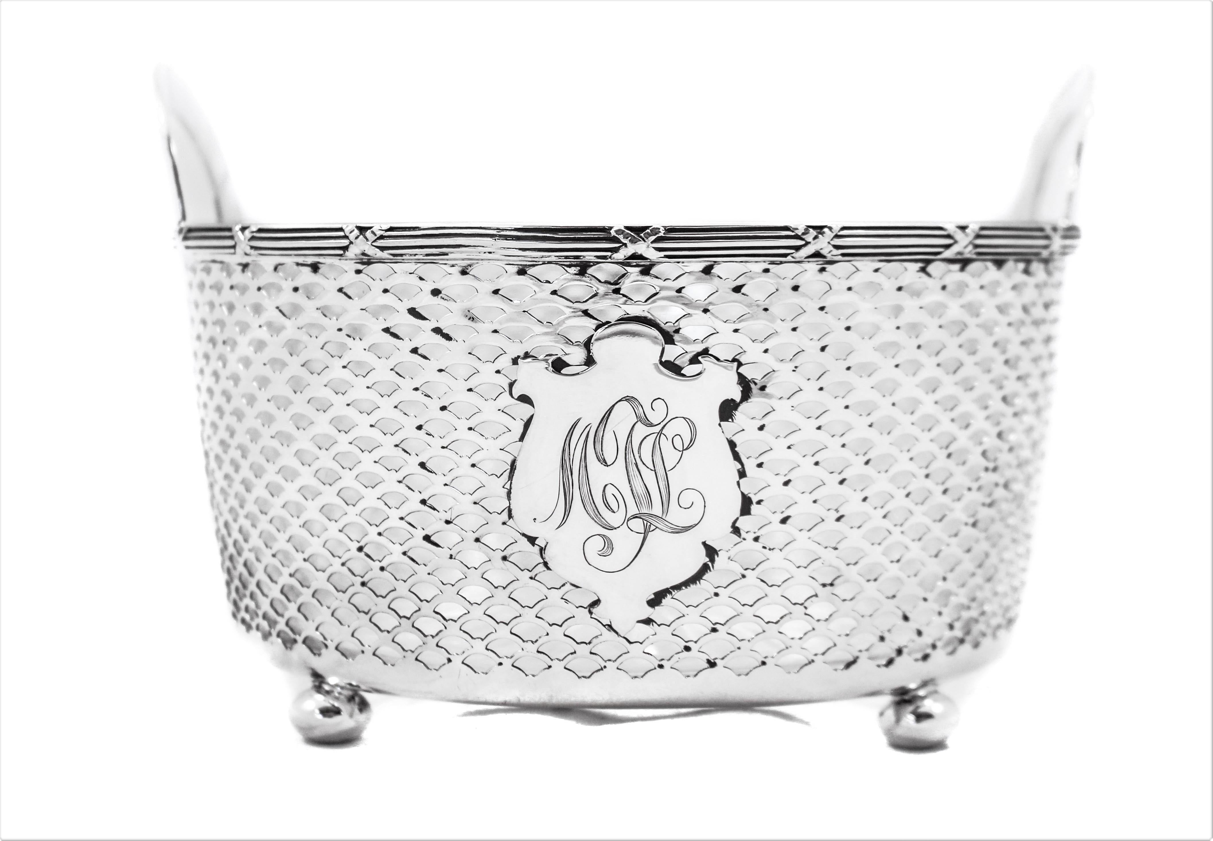 We are happy to offer this sterling silver ice bucket with the original glass liner. Notice the gorgeous starburst on the glass bottom. The liner is removable making it a super easy to wash and return. The sterling is reticulated with a cartouche in