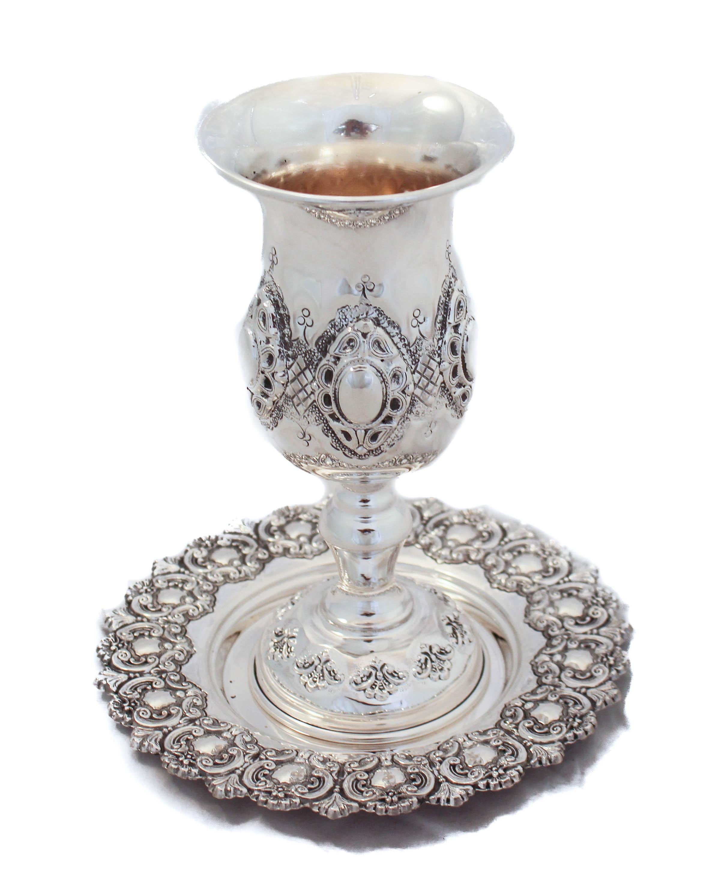 The Sabbath is often referred to as “The Sabbath Queen” and what better way to usher in the holy day than with sterling silver?!
We are happy to offer you this sterling silver Kiddush cup and plate from Israel. It has a rich and impressive
