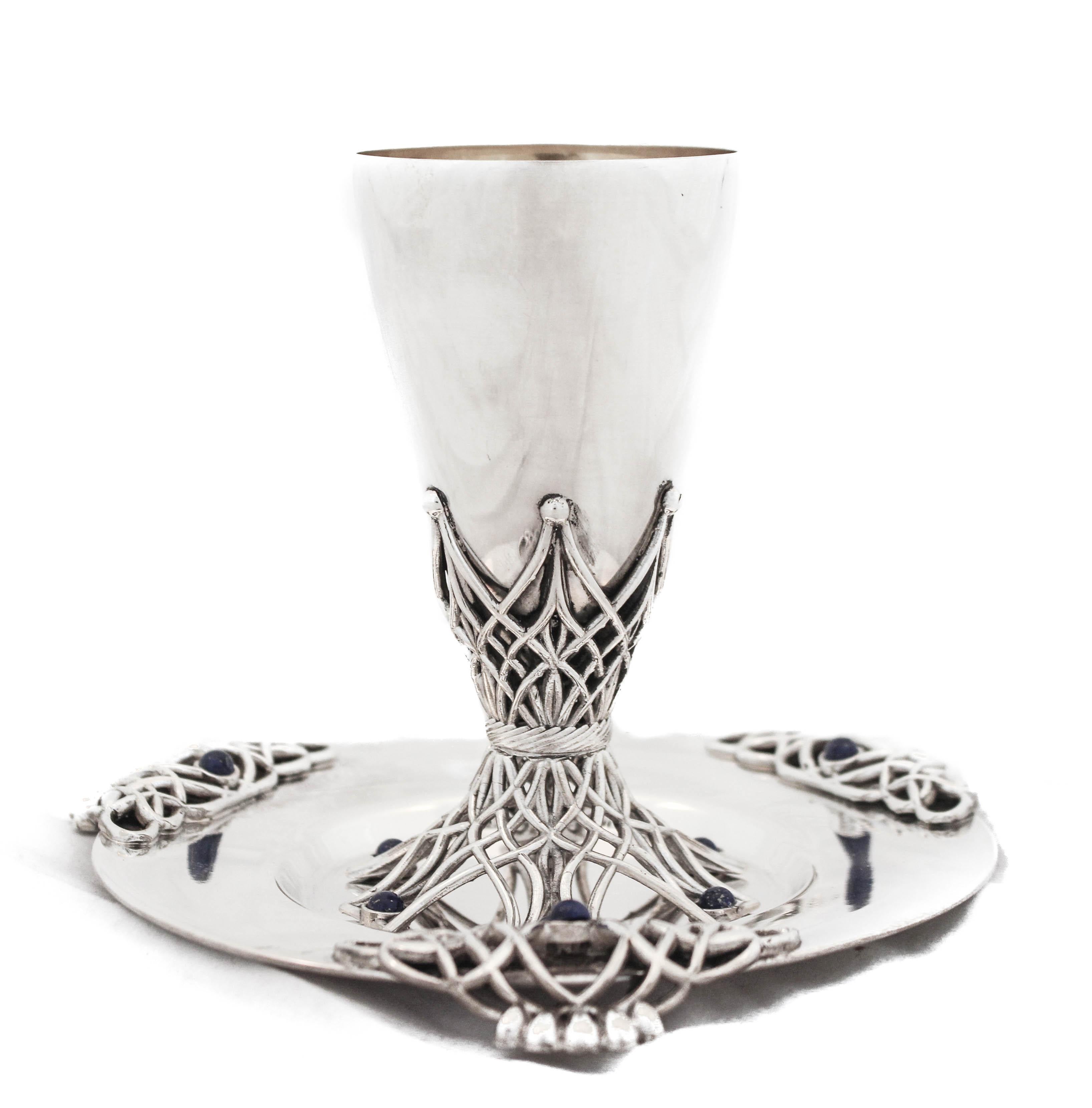 This sterling silver goblet and plate are made in Israel. They have Lapis stones in both the plate (around the edge) and cup (on the base). It’s a beautiful mix of modern and intricate cutout work. The cup and plate are like jewels waiting to