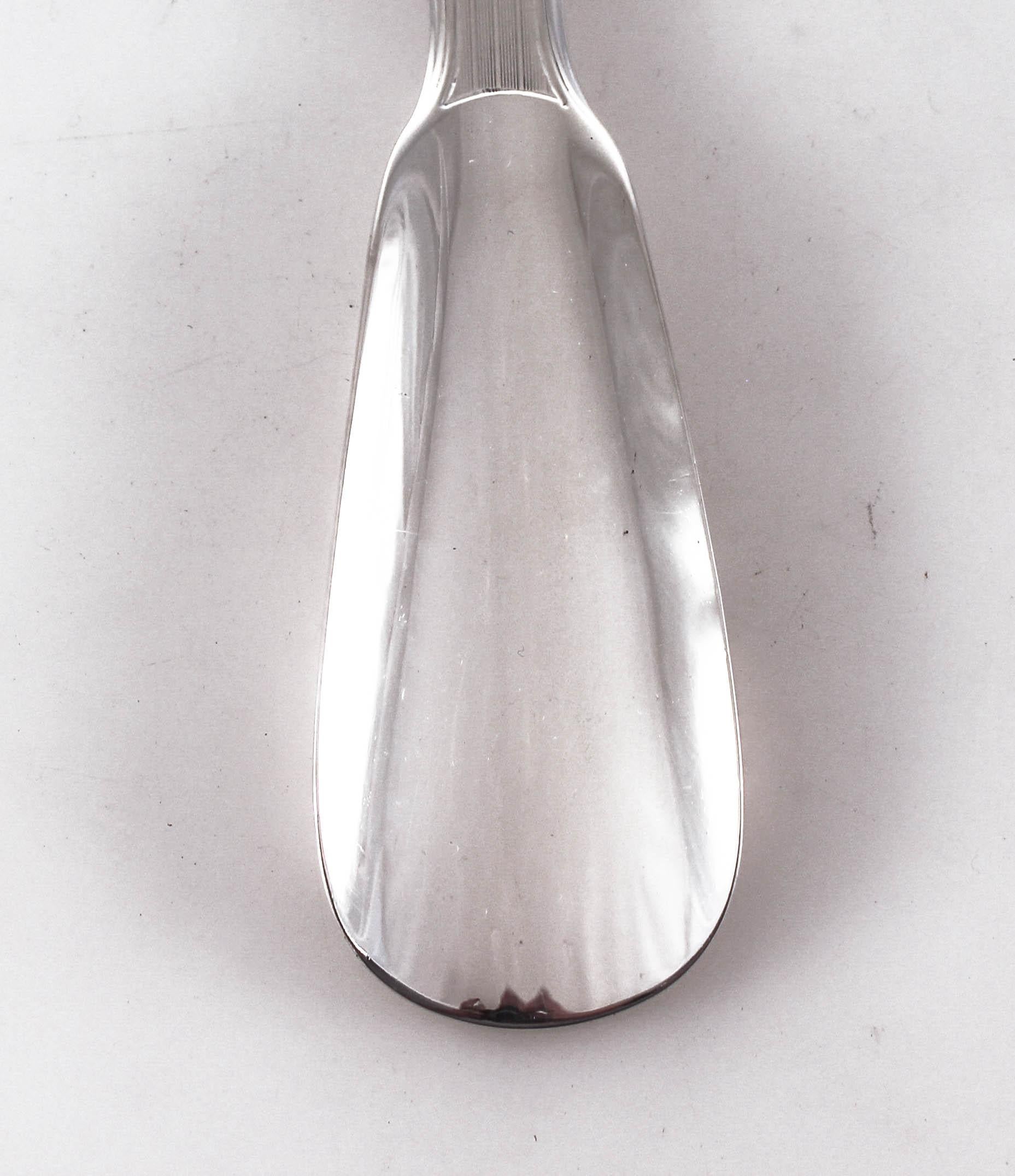 We are proud to offer this sterling silver men’s shoehorn. A very rare find, it is completely sterling silver from top to bottom. It has a pinstripe pattern on the handle giving it a handsome masculine appeal. A great Christmas, birthday,