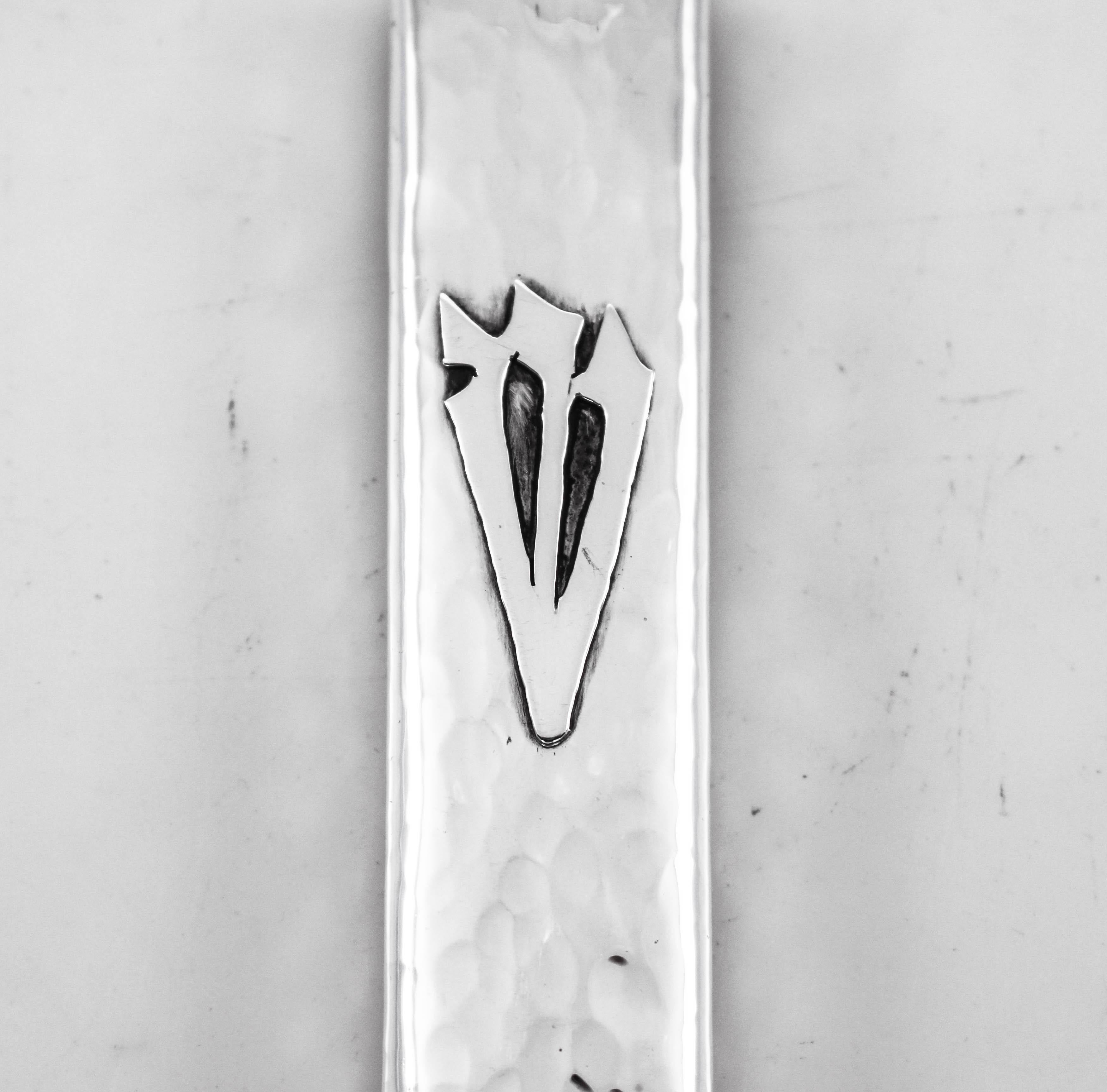 We are proud to offer this sterling silver mezuzah case. A mezuzah is a piece of parchment contained in a decorative case and inscribed with specific Hebrew verses from the Torah. These verses consist of the Jewish prayer Shema Yisrael, beginning