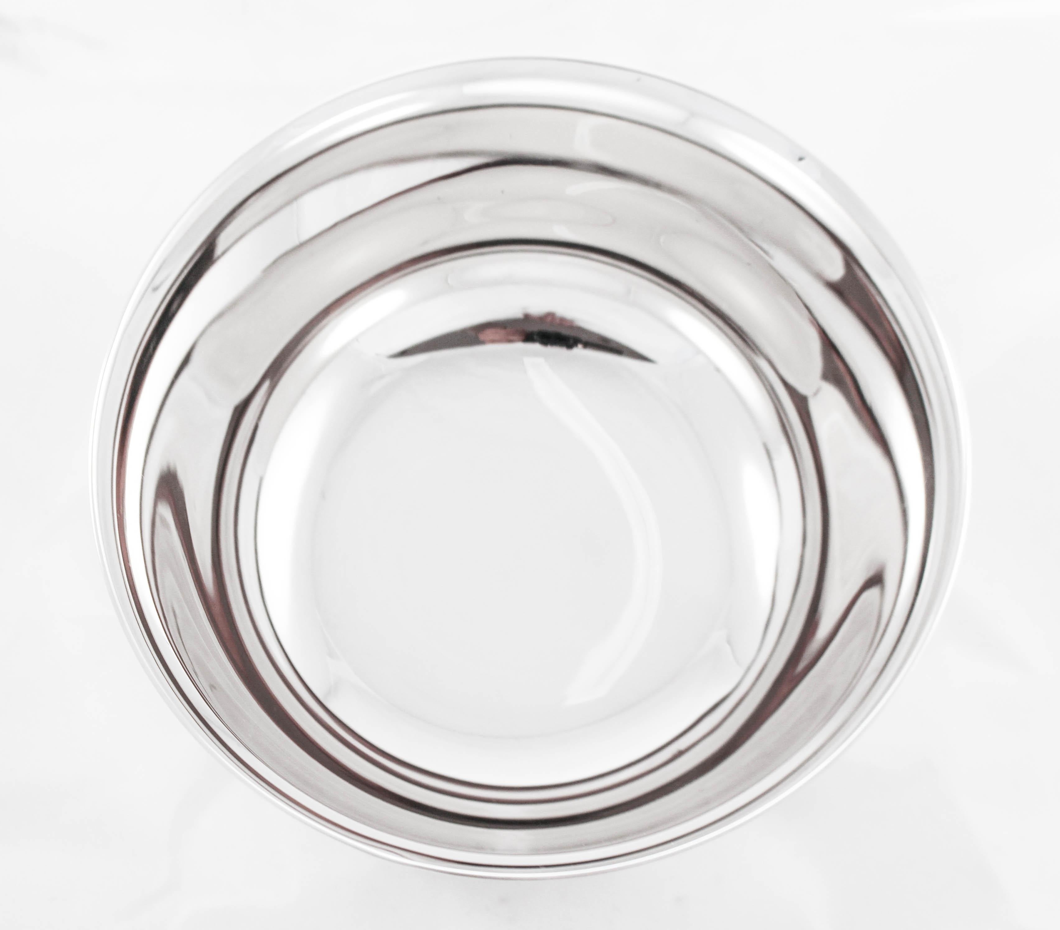 This sterling silver bowl by Lunt Silversmiths is reflective of the midcentury period. Modern with no decoration, it’s more about functionality than decorative. However midcentury is now seen as a style all onto itself and is very sought after. Less