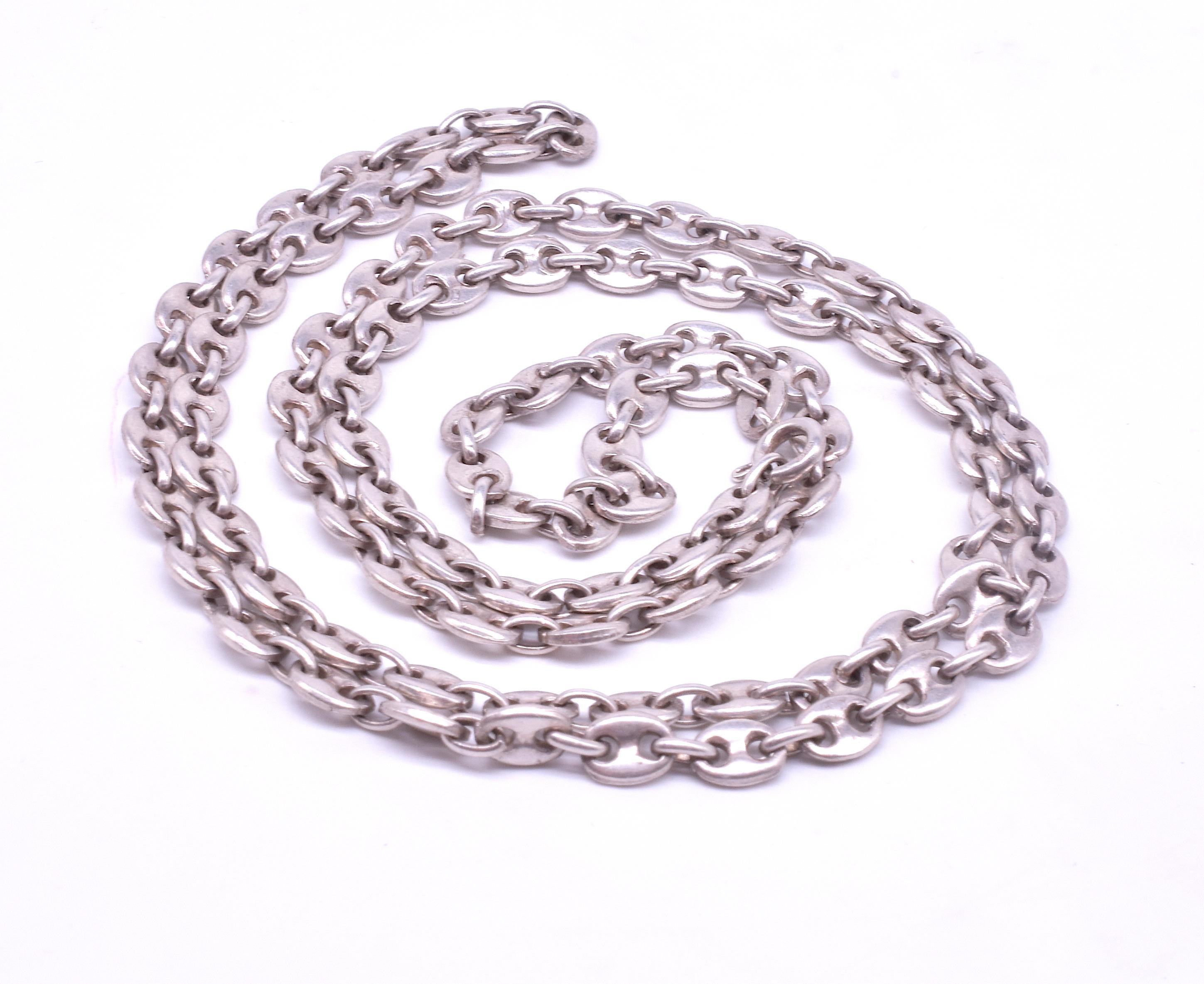 A twentieth century Italian nautical link sterling silver link chain necklace with delicate anchor links, the anchor link is a Victorian symbol (and perhaps earlier) of strength and robustness. The name of this chain design derives from its