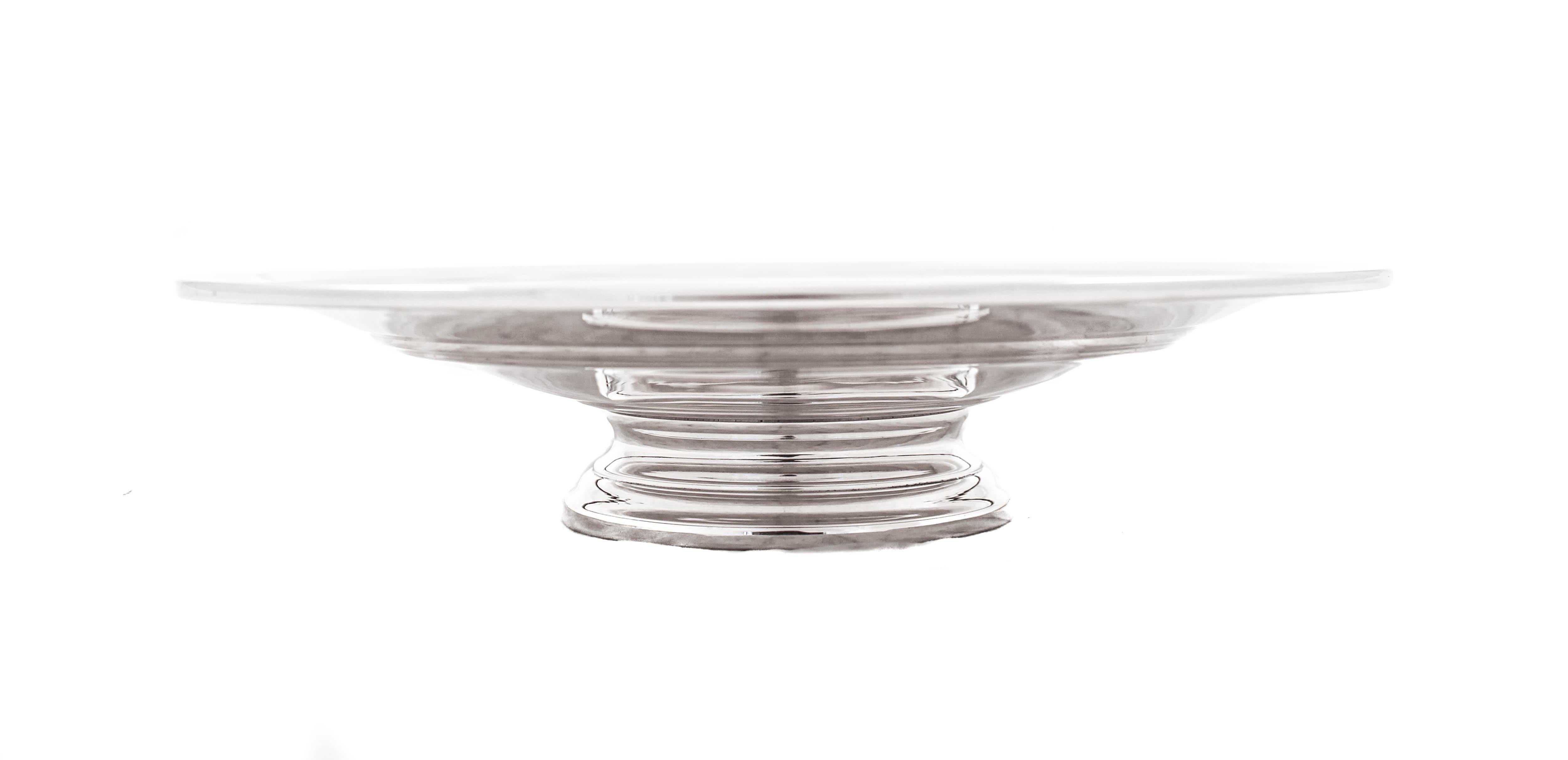 We are offering this sterling silver midcentury bowl. If less is more than this is for you. Standing on a pedestal this bowl has no etchings or decoration. Just a few ridges along the circumference give it a more modern style. The bowl is not too
