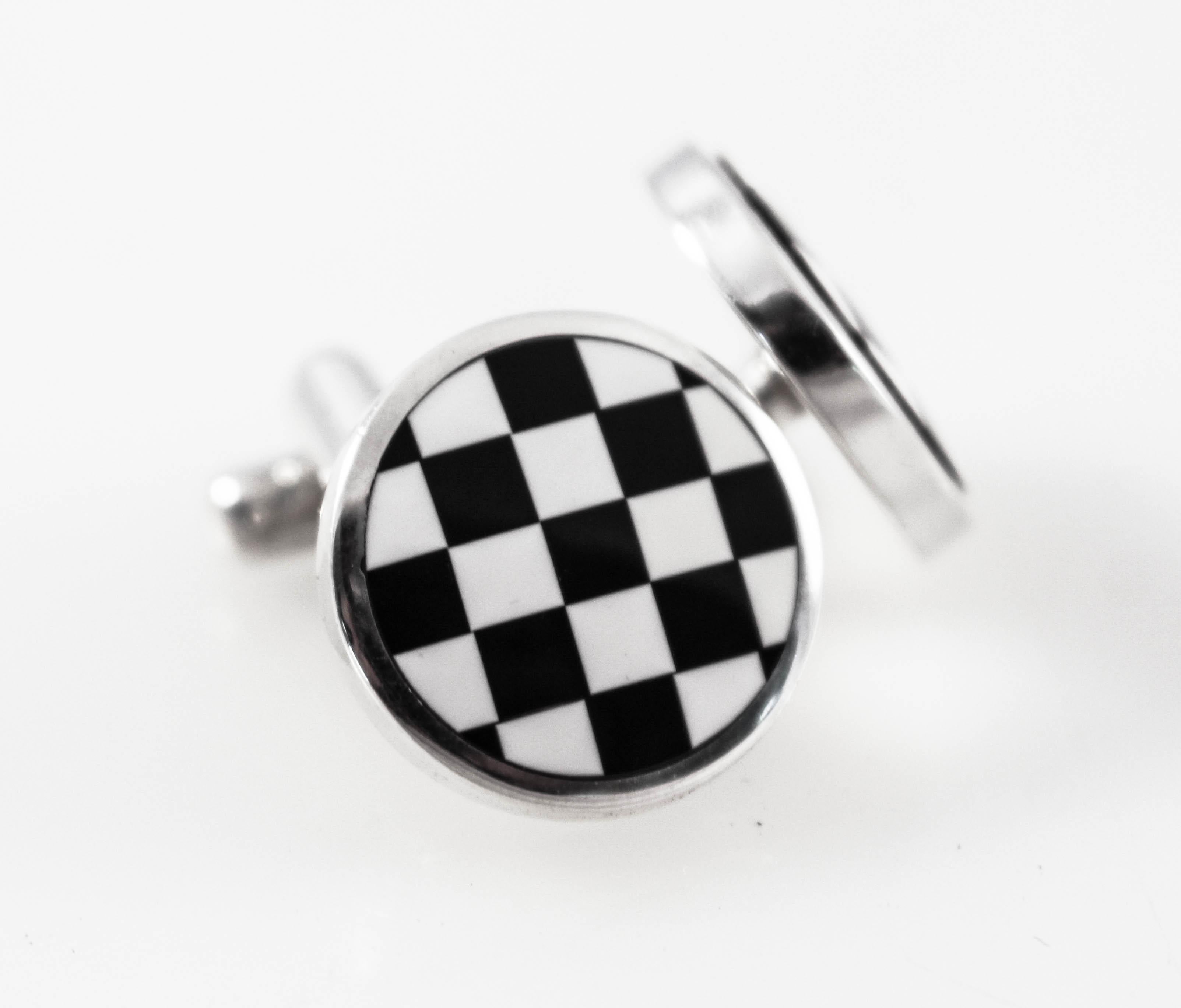 Just in time for Father’s Day and/or graduation, we are offering these sterling silver cufflinks. Made in England, they are black onyx and mother of pearl. They have a checkered design giving them a young almost playful feel. Give that special man