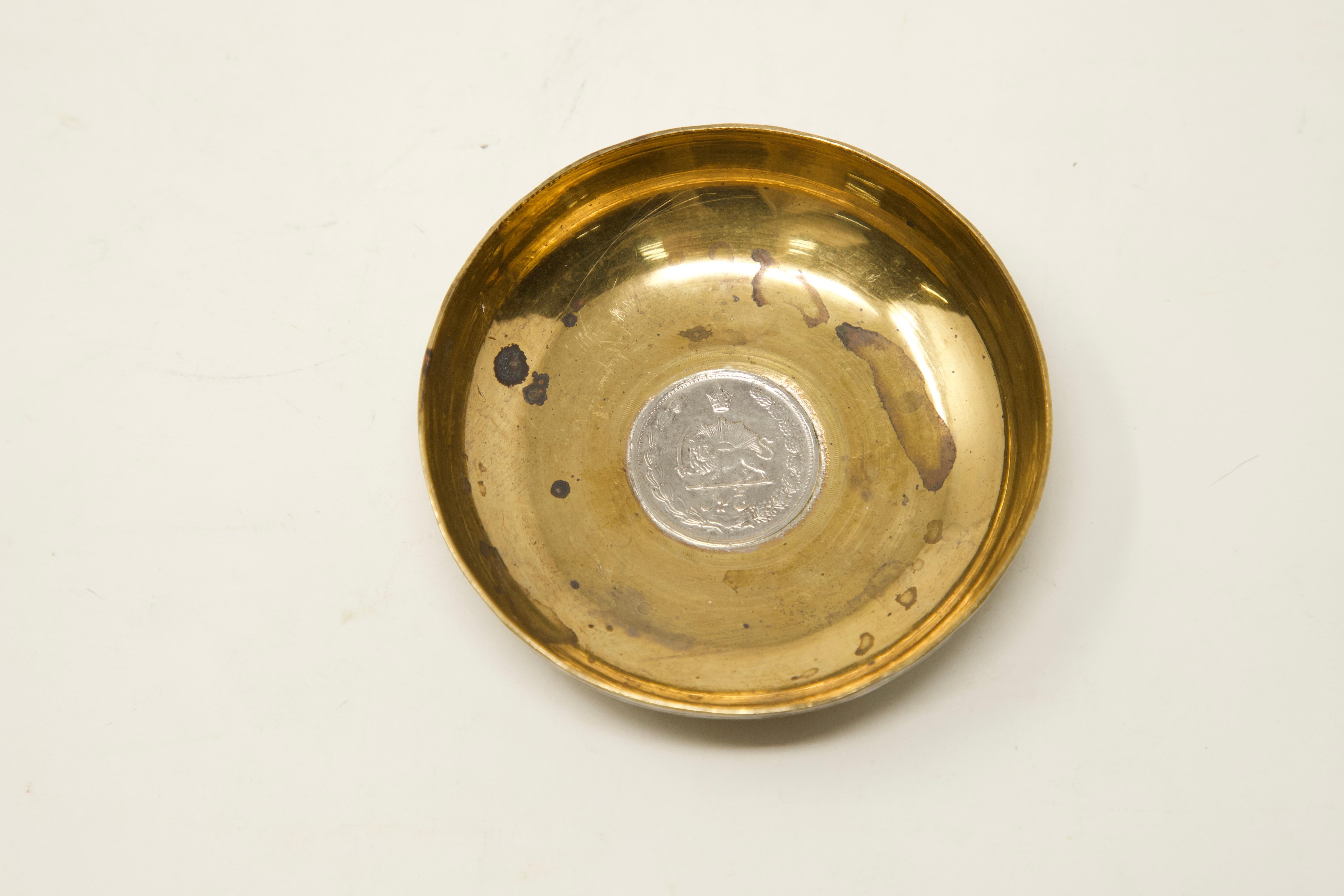 Offering this sterling over copper coin dish.