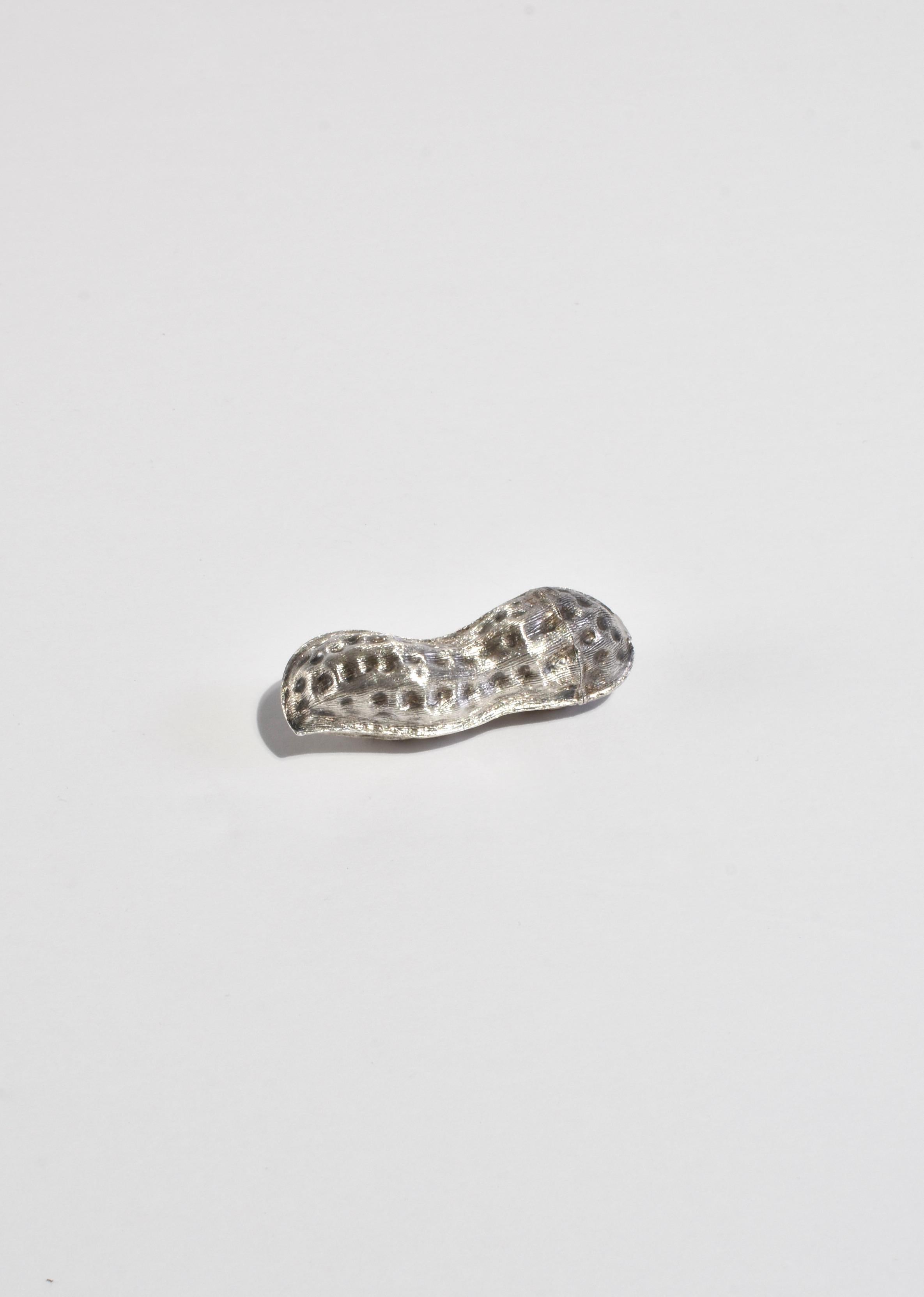 Vintage hand-crafted sterling pill box in the shape of a peanut.