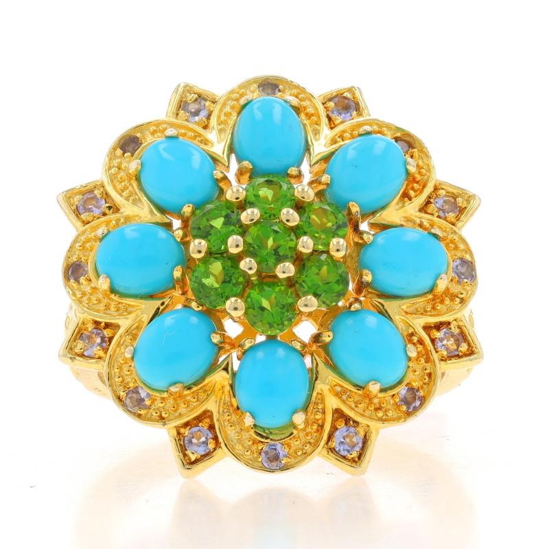 Size: 10

Metal Content: Sterling Silver (gold plated)

Stone Information

Natural Peridot
Carat(s): .84ctw
Cut: Round
Color: Green

Natural Turquoise
Treatment: Routinely Enhanced
Cut: Oval Cabochon
Color: Blue

Natural Tanzanites
Treatment: