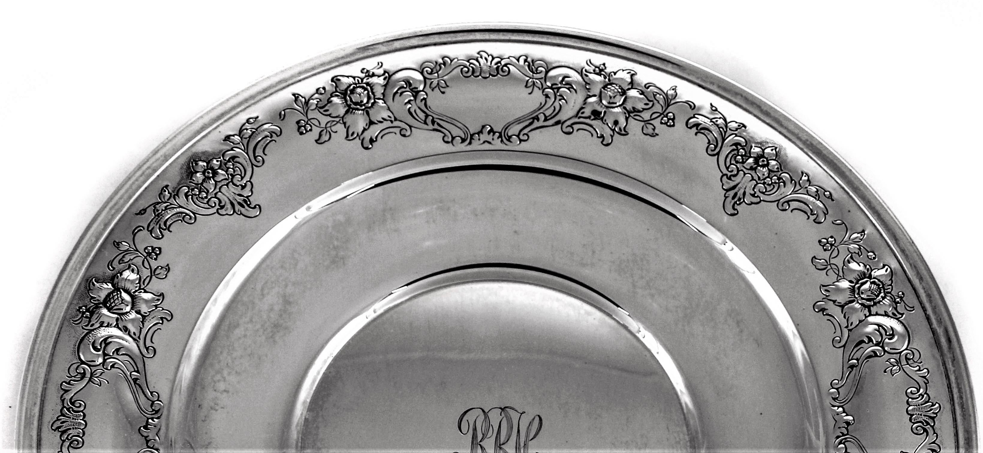 This beautiful sterling plate has etched flowers and leaves going around the entire border. In the center there is a hand engraved script monogram. Perfect for pastries or hors d’oeuvres.