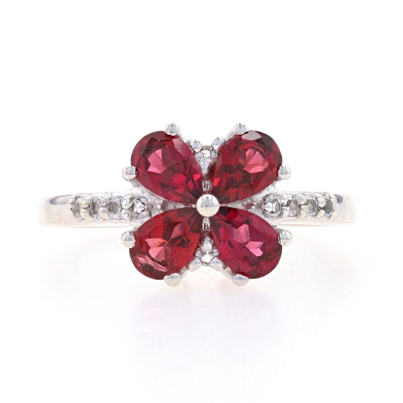 Size: 9
Sizing Fee: Up 2 sizes for $30

Metal Content: Sterling Silver

Stone Information

Natural Rhodolite Garnets
Carat(s): 1.60ctw
Cut: Pear
Color: Purplish Red

Natural White Topaz
Carat(s): .28ctw
Cut: Round

Total Carats: 1.88ctw

Style:
