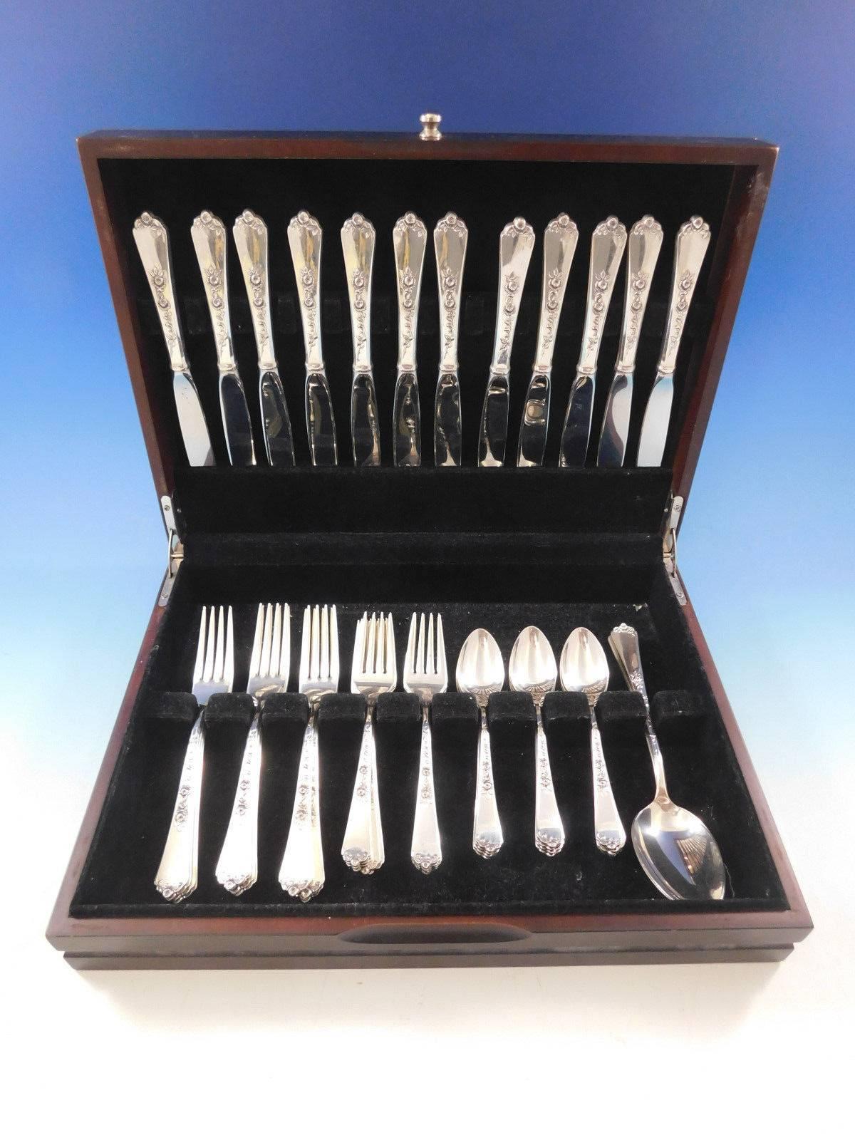 Stunning Sterling Rose by Wallace sterling silver Flatware set - 50 pieces. This set includes:

12 Knives, 8 7/8