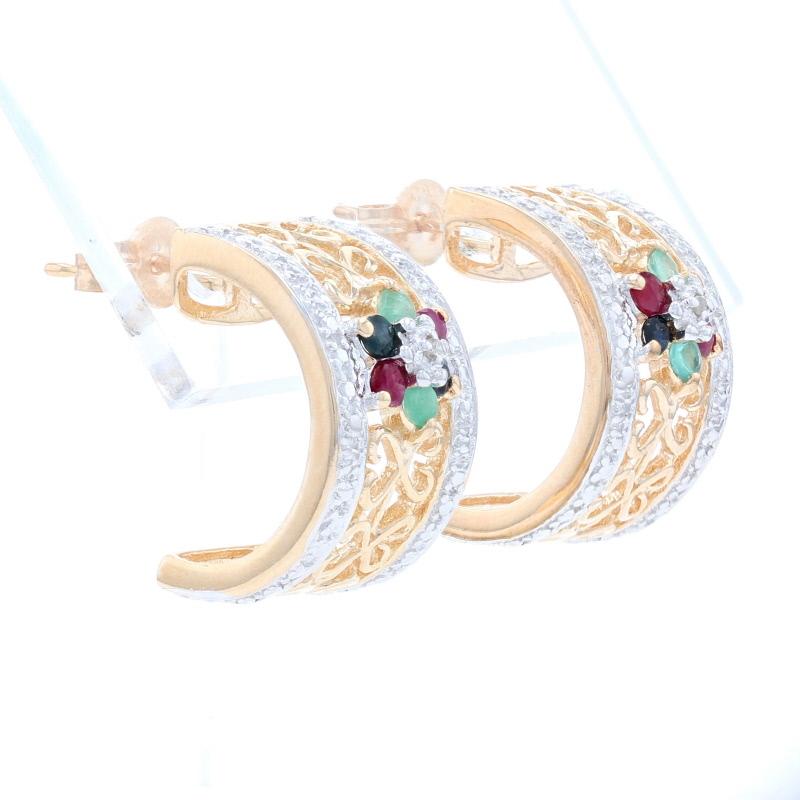 Metal Content: Sterling Silver (gold plated)

Stone Information
Natural Sapphires
Treatment: Heating
Carat(s): .20ctw
Cut: Round
Color: Blue

Natural Rubies
Treatment: Heating
Carat(s): .20ctw
Cut: Round
Color: Pinkish Red

Natural