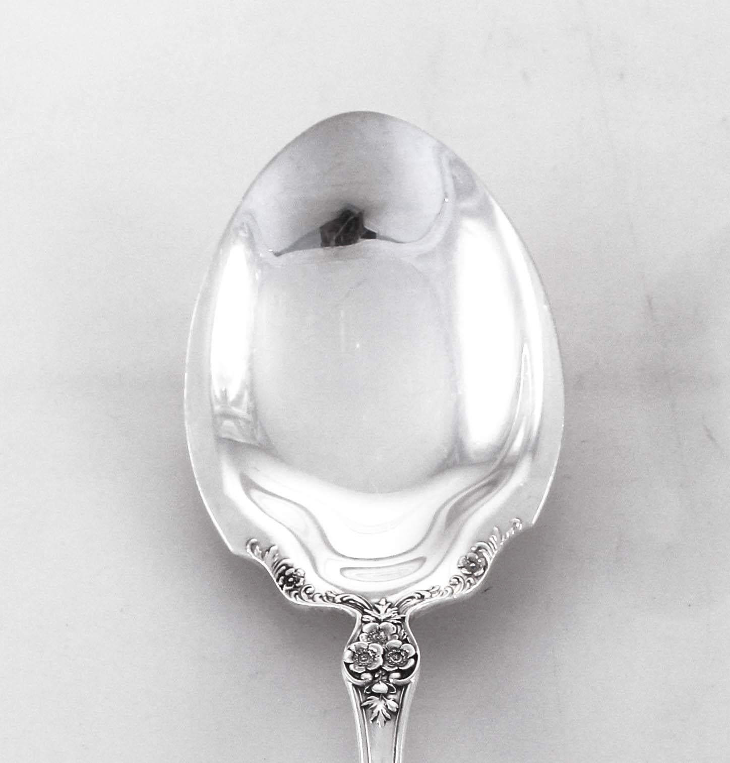 Buttercup by Gorham Silver Co., a lovely pattern that has been delighting customers for over one hundred years. This sterling silver serving spoon is not only beautiful but practical. Use it when serving dinner or desserts.