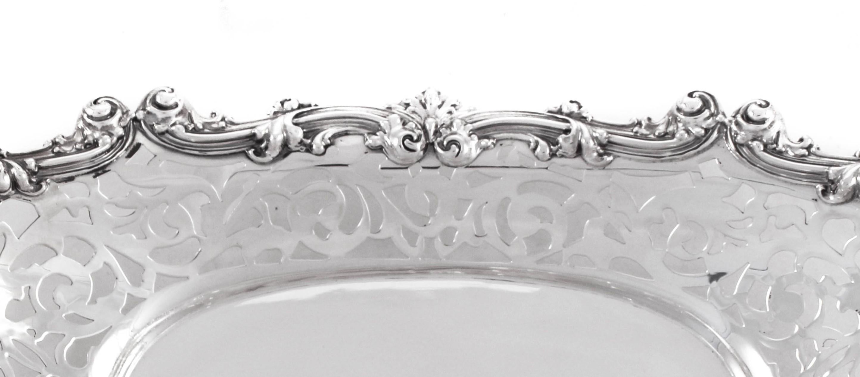 A reticulated breadbasket by one of the greatest Silversmiths in American history, George Shiebler. His pieces are extremely rare and very sought after. This lovely piece has a rich and delicate air, but actually heavy and has withstood the test of