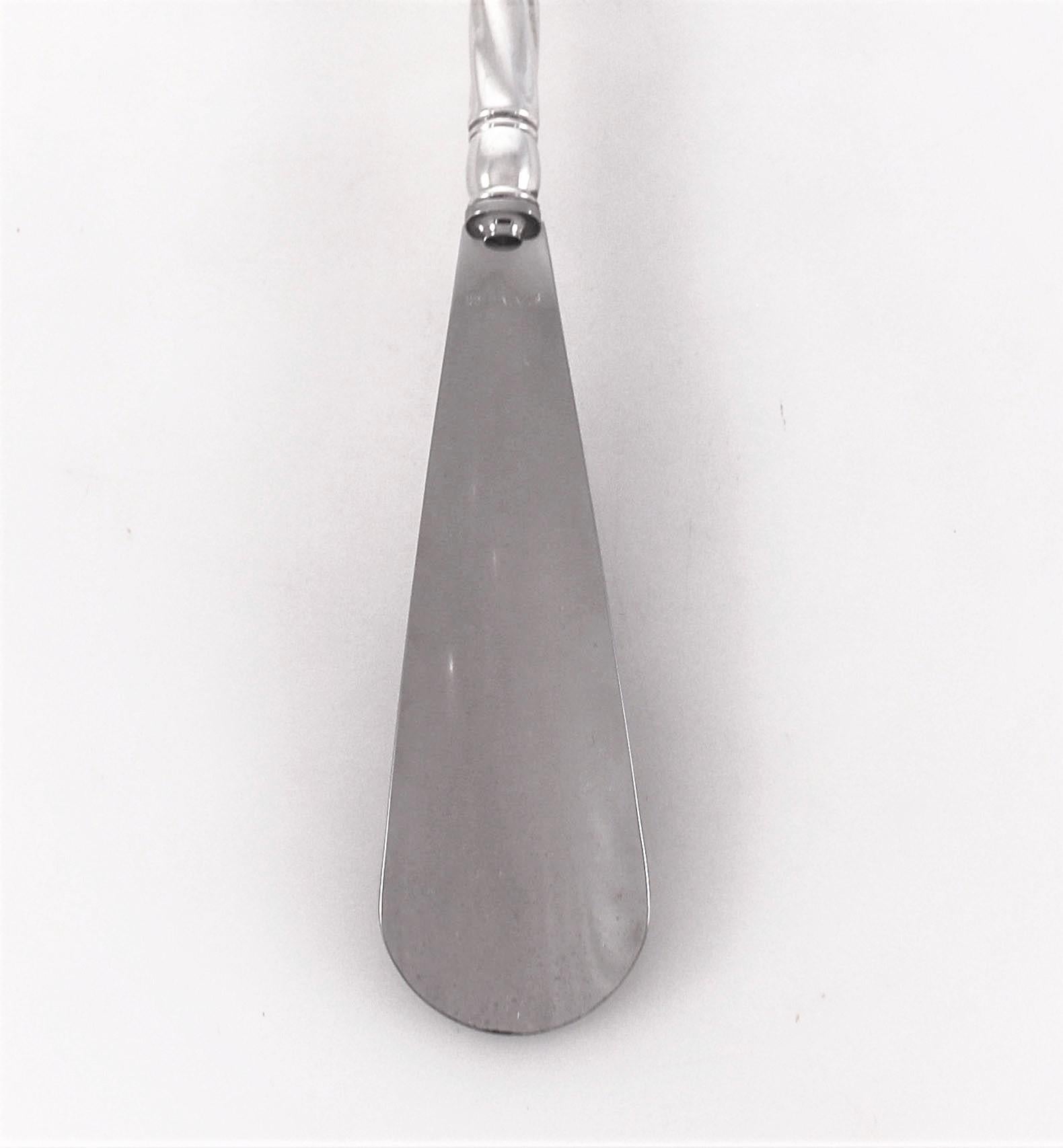 Offering a sterling silver unisex shoehorn. It has an extra long handle that is ideal for not having to bend down. The handle has a modern swirl design which makes it unisex. A great gift for that someone that has (almost) everything.