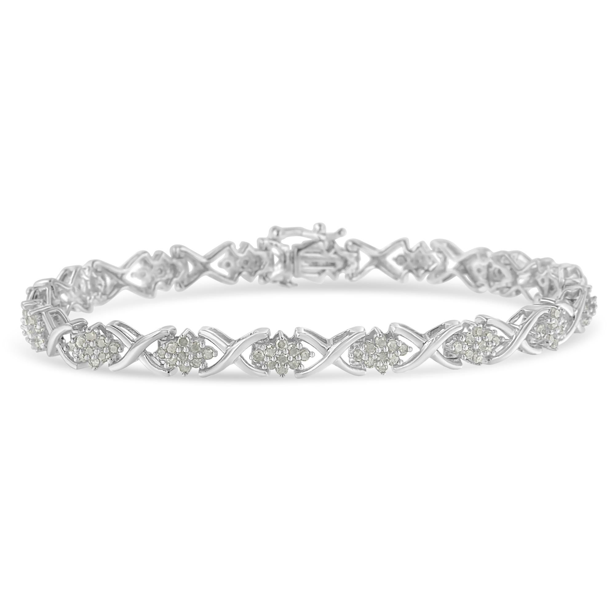 This stunning link bracelet is sure to add a bit of glamour to your everyday outfit. Made with the finest .925 sterling silver, this piece is created with 144 round cut diamonds embellished in a prong setting. Each cluster of rose-cut diamonds in