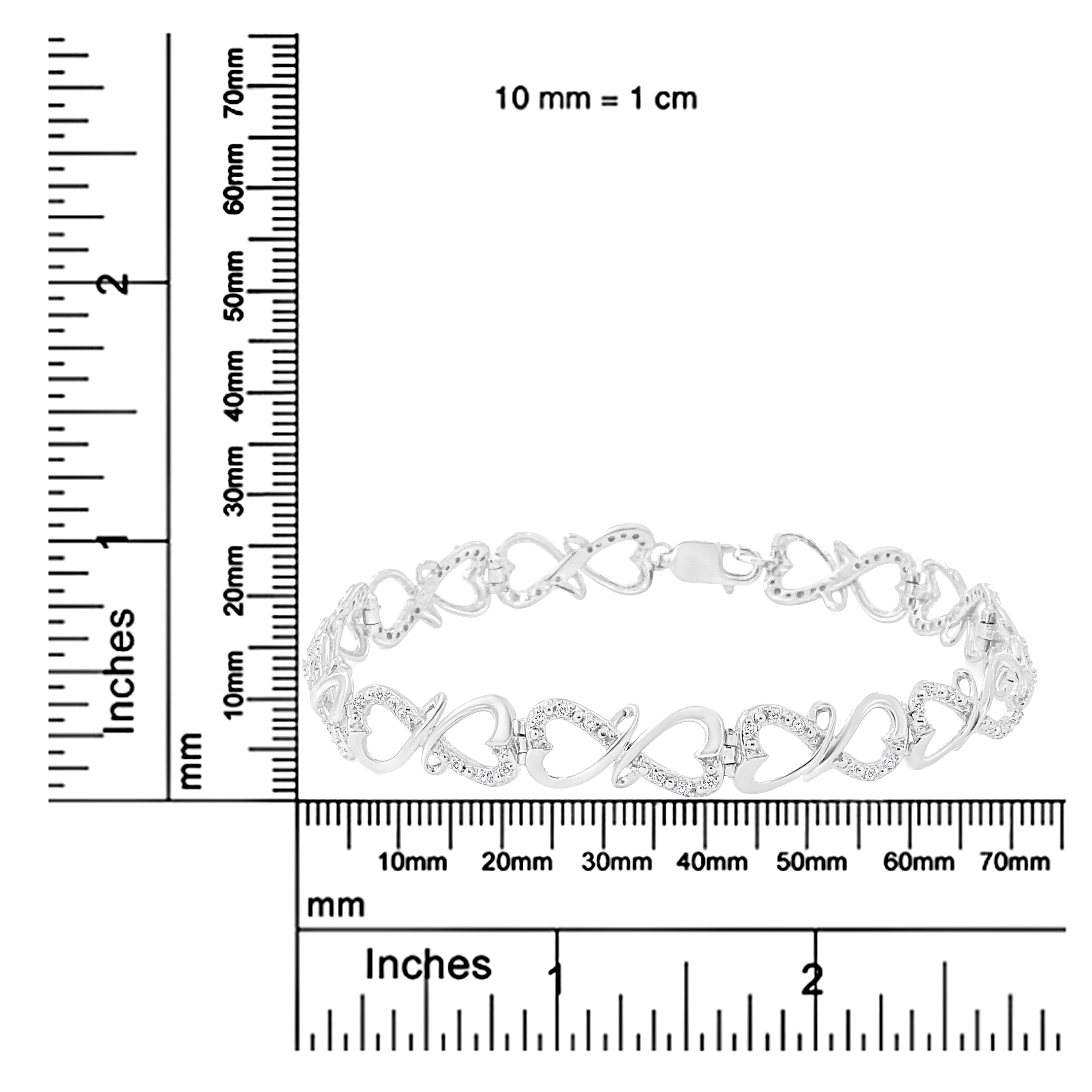 Women's Sterling Silver 1/3 Carat Round-Cut Diamond Double Heart Infinity Link Bracelet For Sale